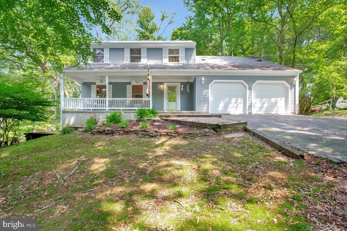 Multiple offer situation. Please submit your best and highest offer by Wednesday, August 9, 2023 at 6:00 PM.
Welcome home to this spacious colonial ideally situated on a quiet cul-de-sac in the sought-after Eutaw Forest community in Waldorf, MD. Boasting a prime location and a host of desirable features, this home presents an enticing blend of comfort, style, and functionality. The charming covered front porch with ceiling fans is shelter for you and your guests to enjoy gorgeous views in any type of weather and all seasons. Walk in to the great flow between the generous kitchen and living areas, with a welcoming front living room and family room with brick fireplace. Large windows in every room bring in an abundance of natural light and look out on green forest views.
Upstairs are 4 bedrooms – each with a ceiling fan, and 2 full bathrooms. 3 of these bedrooms are huge with gigantic closets; ideal for a family.
Step outside into your own private oasis. The backyard is an entertainer's delight, featuring a deck and a patio area perfect for summer barbecues or enjoying a morning coffee while listening to the birds sing. The idyllic fenced backyard extends into private woods included on the property beyond the fence.
Double-garage with a workbench and room for storage can double as a workshop.
Nestled in the heart of Waldorf, this home offers easy access to a wide range of amenities. From shopping centers and restaurants to parks and recreational facilities, everything you need is just a short drive away. And this serene community is an easy commute to DC! Don't miss the opportunity to make 8213 Seven Pines Lane your new address. Schedule a showing today, as this gem won't stay on the market for long!