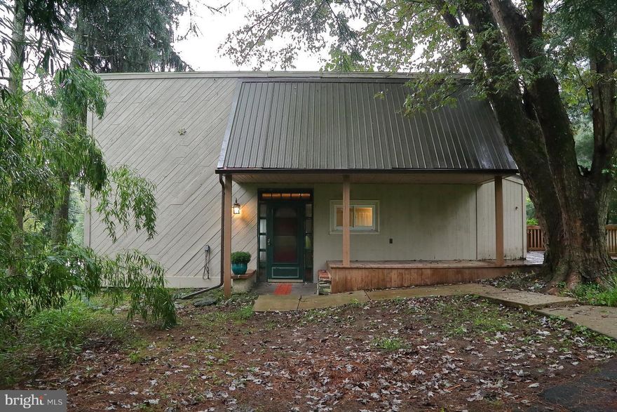 Magnificent view, just around the corner from the Lancaster County Park.  This single house is nestled beneath towering trees.  It has some fresh paint, a newer roof, replacement windows and more.  The garage will stay in its present condition, look at the garage from the outside.  Easy parking.  Why pay rent when you can own this adorable property.