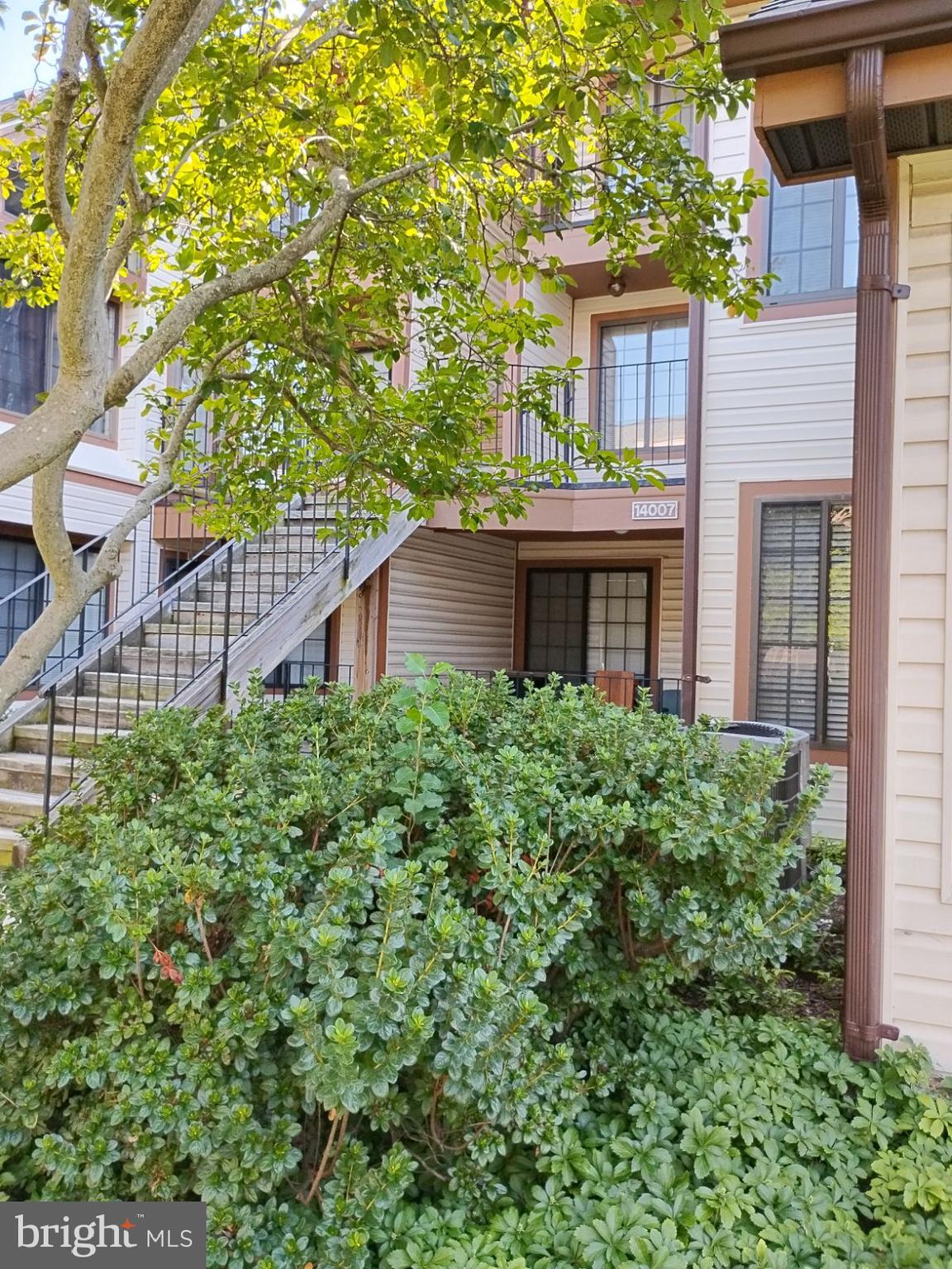 3 percent closing help offered. No FHA offers accepted. Almost new!! Beautiful and unique 2 bedroom/2 bathroom condo with loft and one-car garage at the Tiers of Laurel Lake community. This bright and open floor plan offers a living room with a 2-story vaulted ceiling, expansive windows, stairs to second-story loft, and gleaming low maintenance vinyl floors which lead out onto a personal balcony overlooking the landscaped courtyard. The large totally updated kitchen with beautiful cabinets, quartz counters, quartz wet bar, stainless steel appliances, a new under water filtration system with separate faucet, and new light fixture opens to an eating area in the living room. Beyond the kitchen is the master bedroom with ensuite bath, second bedroom, hall bath and second entrance hallway with new water heater, HVAC, and stackable washer/dryer. Both baths newly updated with new vanities/faucets, new flooring and custom tiling in tub surround. Recessed lighting to provide extra lighting in kitchen halls and breakfast nooks. Neutral painted and Loft conversion to 3rd bedroom possibilities.