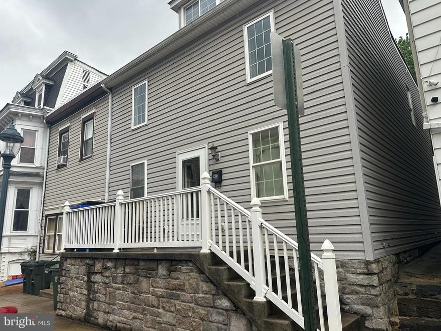 Renovated Home move in ready.3 finished levels. New carpet new paint perfect move in ready. Fenced back yard and 4 car parking in the back of the home. New Bathrooms and appliances. Walk to the Baseball stadium. Ask about 100 percent loans. 2 Family rooms l main level and upper level.