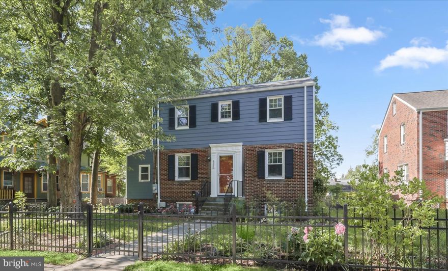 Blending timeless character with thoughtful updates, this charming Colonial home, built in 1939, offers inviting living spaces, a finished walkout lower level, and a convenient location in the heart of Riverdale Park. A gated front yard with mature landscaping and a stone walkway creates a warm welcome, while inside, hardwood flooring and light neutral wall colors establish a bright and serene atmosphere throughout the home.
To the left of the foyer, the living room features a cozy brick surround fireplace flanked by a wall of built-in bookcases, creating an ideal gathering space for relaxing evenings at home. Just beyond, a versatile den provides the flexibility for a home office, playroom, or hobby space with a convenient attached half bath. The dining room is conveniently situated between the foyer and kitchen, offering an easy flow for everyday living and entertaining.
The kitchen combines style and function with granite countertops, glazed cabinetry that adds depth and detail, stainless steel appliances, and a pantry for added storage. Upstairs, the primary bedroom includes a walk-in closet and a private en suite bath with a tiled tub shower surround. Two additional bedrooms share a well-appointed hall bath.
The finished lower level expands the living space with a recreation room featuring luxury vinyl plank flooring, a utility room, and walkout stairs providing direct access to the backyard. Outdoors, the fenced backyard is designed for both relaxation and productivity with a deck, raised garden beds, and a storage shed.
Perfectly positioned near everything Riverdale Park has to offer, this home is moments from the MARC train station, Trolley Trail, Riverdale Park Farmers Market, and local favorites including Manifest Bread, Riviera Tapas Bar, 2Fifty Texas BBQ, Denizens Brewing Co., Whole Foods, Trader Joe’s, Starbucks, and Burtons Grill.