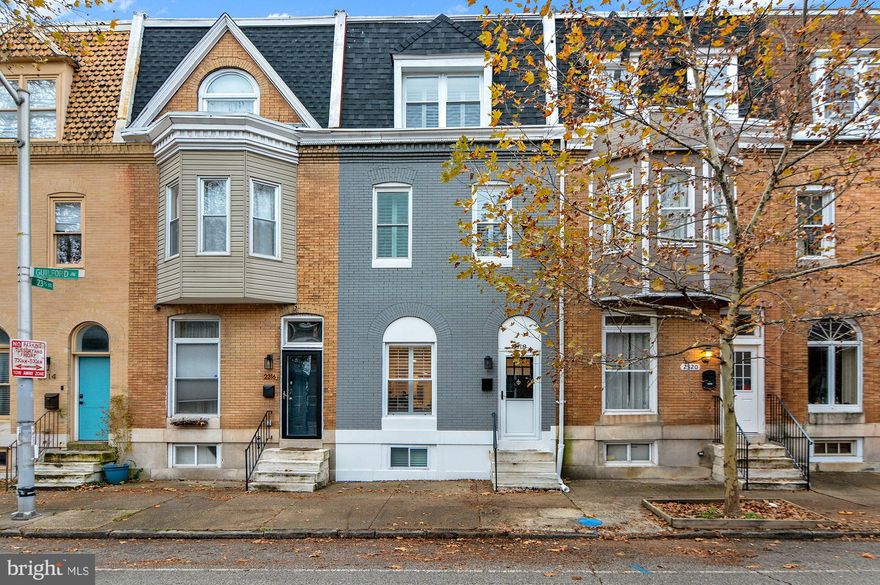 Amazing opportunity to own this one of a kind home in the highly desirable neighborhood of Old Goucher 21218 at an incredible value! This home has been tastefully redone with loads of upgrades and offers 3 LEVELS of finished living space! The main level boasts soaring 10 foot ceilings with recessed lighting, and an open concept all the way to the magnificent kitchen with white shaker cabinets, quartz and butcher block counters, and a sleek tiled back splash! Walk out the rear door to your trex deck and composite fenced-in rear yard! The 2nd level comes with 2 spacious bedrooms with LVP flooring and a fully custom tiled bathroom. The 3rd floor is your oversized primary suite with a bonus laundry room with high end appliances! The primary suite also includes a mini-split unit, ceiling fan, a custom closet with built-ins and a beautifully tiled full bathroom. This home also includes custom plantation shutters on all windows, newer roofing shingles and a fresh silver coating on the flat roof! This home is ready to go for you to move right in! Don’t miss your chance to see this gorgeous home. Schedule your tour today!