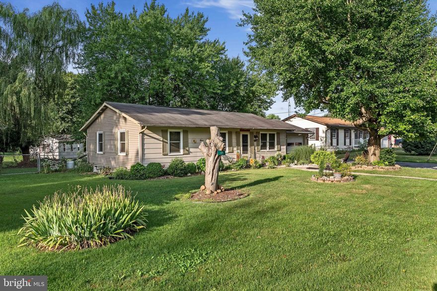 Introducing a charming rancher nestled in the picturesque Tuscawilla Hills. Boasting three spacious bedrooms and a well-appointed bathroom, this home provides comfort and space for your family. The ample garage and driveway ensure plenty of parking and storage.

The expansive flat yard, just under half an acre, is an ideal setting for gatherings with friends and family. The fenced-in rear yard not only offers a safe space for children and pets to play freely but also invites relaxation amidst the beautifully landscaped surroundings. Explore the bounties of nature with blackberry, apple, and peach trees right on the property.

Capture moments of serenity by the front pond, creating the perfect ambiance for unwinding. Inside, the home features new windows, blinds, and a sliding glass door, enhancing its aesthetics and energy efficiency. Situated on a large cul-de-sac, you'll enjoy the benefits of limited traffic.

The eat-in kitchen provides a spacious area for meal preparation and dining, while the inviting living spaces offer comfort and versatility. The home is not only a great starter option but also an excellent choice for a small family seeking a new abode. Don't miss the opportunity to make this charming rancher your own slice of Tuscawilla Hills paradise.