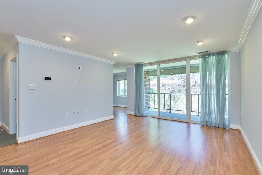 Stunning, fully updated condo in Reston! Fantastic location -  within walking distance to beautiful Lake Anne, Silver line metro and the best of Reston Town center! This 2 bedroom, 2 bathroom condo is bright, spacious and ready to move in! Enjoy the panoramic view of the common area from the living room, dining room and the large deck! The kitchen is fully updated with brand new glass tile backsplash, granite countertops, upgraded cabinetry, gas cooking, stainless steel appliances, ceramic tiled floors and more! There is a separate dining room in addition to a large living room.  The primary bedroom offers a walk in closet with built in shelving and an en-suite full bathroom. The second bedroom also offers a large closet with closet organizers. There is a second full bathroom. Both bathrooms are updated. The entire condo is freshly painted an appealing neutral color. Laminate flooring through out the unit.  Fan/lights in both bedrooms. Recessed lighting, crown molding are some of the notable features of this condo. Washer and dryer are in unit. The condo fees covers all utilities - electric, gas, trash, snow removal and water!! The condo association maintains the entire central heating and cooling system. They also do regular filter maintenance! The windows and sliding glass door replacement is also part of the condo fees and they were replaced a few years back. Other notable benefits provided by the condo association are an on premise maintenance crew for any emergency maintenance and also regular pest control and trash service, building master insurance, general common area maintenance, roof maintenance and more! Avail Reston Association amenities such as the many pools, tennis courts, trails, playgrounds, multiple lakes and so much more! Silver metro is about a couple miles away. Reston town center is also close by. Major commuter routes including 267, Rt 7 and more! Close proximity to major companies along the tech corridor! Come see this gorgeous unit today!! Make your move!!
