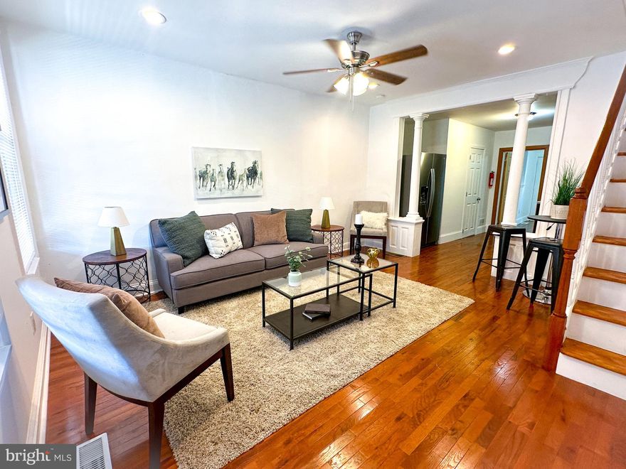 Welcome home! Be the first to live in this newly-renovated 3 bed, 2 bath row home with a covered front porch and privately-fenced back yard just blocks away from Fairmount Park!  Even better, this home qualifies for this home qualifies for special financing requiring no PMI, 0% down, and up to $5k toward closing costs, saving on both cash to close and monthly payment!, making this home less expensive than renting! As you enter through the front door, you’re greeted with an abundance of natural light, soaring ceiling heights, recessed lighting, hardwood floors throughout, an open concept layout, and beautiful decorative pillars original to the home. The renovated kitchen features brand new stainless steel appliances, tiled countertops, and a beautiful stone and mosaic tile backsplash.  The first floor also features a convenient full bathroom!  Through the kitchen is a bonus room in the home, perfect for use as an office, home gym, playroom, media room, or even a 4th bedroom.  The backyard of the home is newly cemented and features a new privacy fence, making it the perfect place to enjoy a morning cup of coffee or unwinding in the great outdoors after a long day. Upstairs, you’ll find the soaring ceiling heights continue, with the spacious primary bedroom featuring double closets and a gorgeous, built in bookshelf.  The second and third bedrooms are also nicely sized and are next to the 2nd floor full bathroom.  Downstairs, the clean and dry unfinished basement area expands the full footprint of the home and could be easily finished or is perfect for loads of storage space. Centrally located, this home is located within 1 to 2 blocks of James G. Blaine School, Gideon Edward School, Rodriguez Grocery, and Wokworks Brewerytown.  3 blocks away is Fairmount Park, featuring Sedgley Woods Disc Golf, Smith Memorial Playground & Playhouse, and The Discovery Center wildlife sanctuary at the beautiful East Park Reservoir.  The home is also just 2 blocks from Ridge Avenue with easy access to Center City through SEPTA Bus Lines 7, 32, 48, 49, and 61 and a 10 minute car ride to I-76, Broad St, and Center City.  Don't miss your chance to make this stunning home your own - schedule your private showing today!