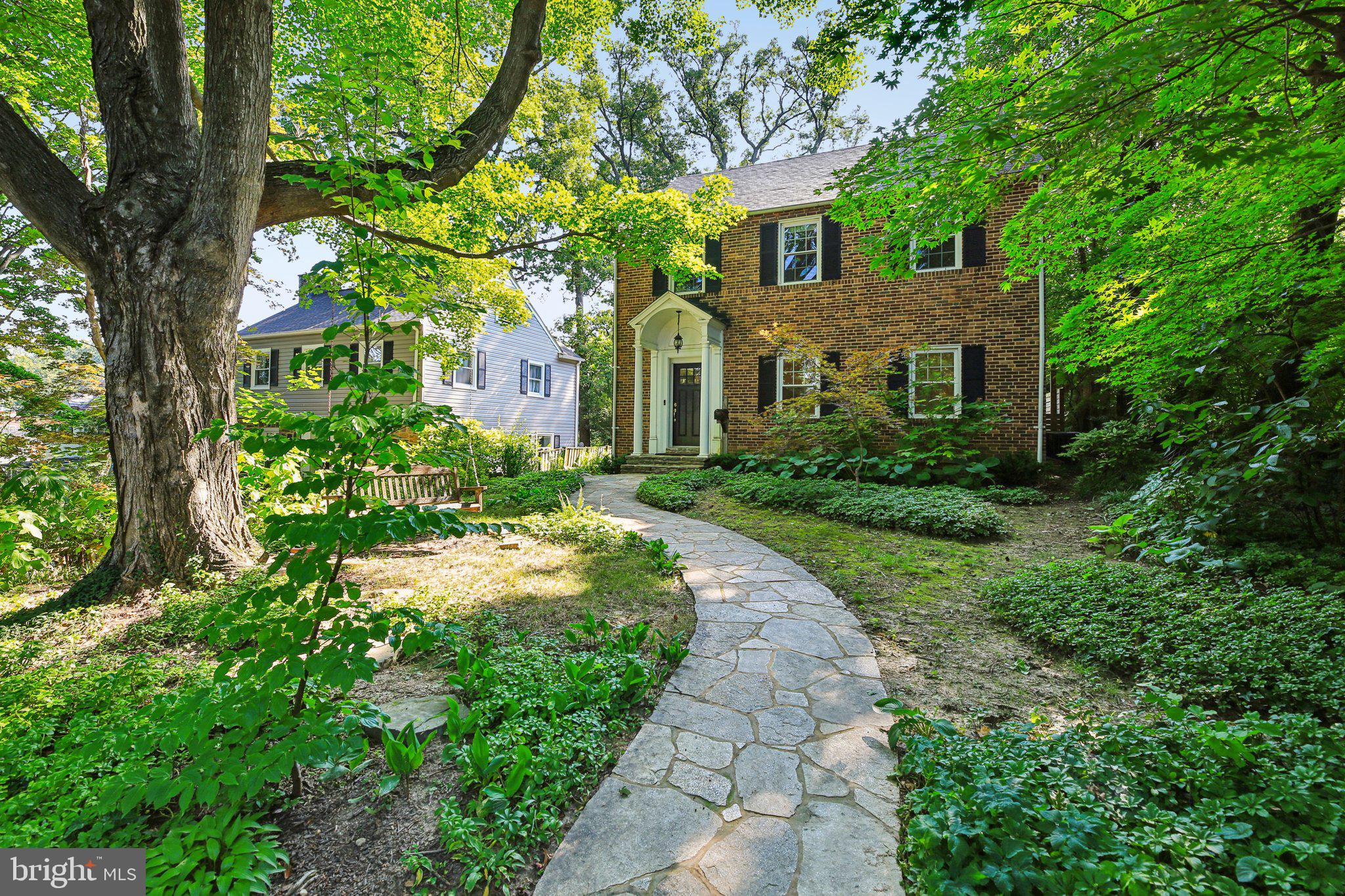 Roland Park Colonial: Modern Comfort Meets Timeless Charm
Experience the best of Roland Park living in this meticulously renovated 4-level brick colonial. This home seamlessly blends its original character with thoughtful modern upgrades, including a stunning new basement suite, a picturesque landscaped garden, and an enviable location that puts top schools and amenities within easy reach.
Inside, natural light floods updated interiors featuring fresh paint and contemporary lighting. The layout flows effortlessly, perfect for everyday living and memorable gatherings. Culinary dreams come alive in the gourmet kitchen, equipped with a charming farmhouse sink, inviting island seating, a wine rack, and bespoke built-ins. Ascend to a tranquil primary suite, where a spa-like bathroom awaits with a luxurious soaking tub, dual rainfall shower heads, and elegant finishes. An adjoining flexible bonus room offers endless possibilities—a nursery, dedicated office, or generous walk-in closet. Continue to the finished attic, a bright bonus space with vaulted ceilings, exposed brick, and smart built-in storage.
The recently finished walk-out basement (2024) boasts luxury vinyl plank flooring, fresh drywall, and a gorgeous full bathroom with marble floors—ideal for guests, an in-law suite, or a private retreat. The versatile finished attic provides even more living space, complete with vaulted ceilings, exposed brick, and smart built-in storage.
Outdoors, your private oasis awaits. Enjoy the expansive deck, cozy fire pit, relaxing hot tub, and a beautifully terraced garden teeming with local wildlife and vibrant colors. A convenient garage and private parking pad complete the exterior.
Recent upgrades enhance peace of mind: a smart thermostat (2022), new water heater (2023), new siding and gutter guards (2023), plus regraded landscaping with improved drainage (2024).
Nestled in a quiet, connected community, you'll find easy access to I-83 and downtown Baltimore, and you're just a short stroll from top-rated schools like Roland Park Elementary, Gilman, Friends, Bryn Mawr, and Roland Park Country School. Move-in ready and truly a rare Roland Park gem!