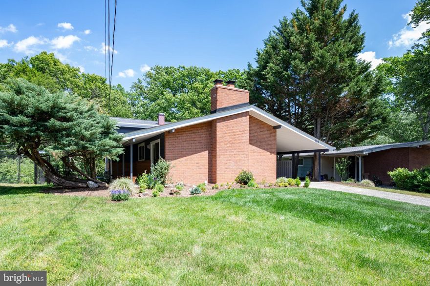 OPEN SATURDAY May 23 from 1-3pm and SUNDAY May 24 from 3-5pm. ***Welcome to 109 Bluff Terrace, a masterfully designed mid-century modern home nestled in one of Silver Spring's most serene settings. This architectural treasure captures the very essence of the mid-century modern philosophy: a seamless conversation between interior living spaces and the natural world just beyond the glass. From the moment you arrive, the clean lines, organic materials, and thoughtful design speak to a home that was built with intention. Walls of windows and open, flowing spaces invite the lush outdoors in at every turn, bathing the home in natural light and creating a tranquil atmosphere that feels worlds away from the bustle of the city yet remains minutes from everything Washington, DC has to offer. Whether you are curled up inside watching the seasons change through expansive windows or stepping out to enjoy the surrounding greenery, this home blurs the boundary between shelter and nature in the most beautiful way. It is the kind of home that slows you down, clears your mind, and reminds you what living well truly feels like. Located in the heart of the DC Metro area, 109 Bluff Terrace offers the rare combination of peaceful seclusion and urban convenience. Commuters will love the easy access to major routes, Metro, and the vibrant Silver Spring corridor, with its acclaimed restaurants, shops, parks, and cultural amenities just moments away.
This is not just a home. It is mid-century modern gem, a lifestyle, and a sanctuary.  This 4 bedroom, 2.5 bath home is larger than it looks from the outside.  It has 2 fireplaces, a carport with a shed, and an expansive backyard that backs to trails and parkland, so there are no neighbors behind you.   It has a coveted location on a cul-de-sac street, so there is no through traffic.  This charming property is move-in ready with many updates and would make a perfect home or investment property. The interior has been freshly painted. New in 2026: HVAC;  refrigerator, stove, dishwasher, carpet, chimney re-pointed and crown repaired.  New in 2025: water heater and deer fence.  New in 2024: roof and gutters, skylights, Hardie Board siding.  New in 2023: Sewer and water pipes to the street.  Open the door to what is next.