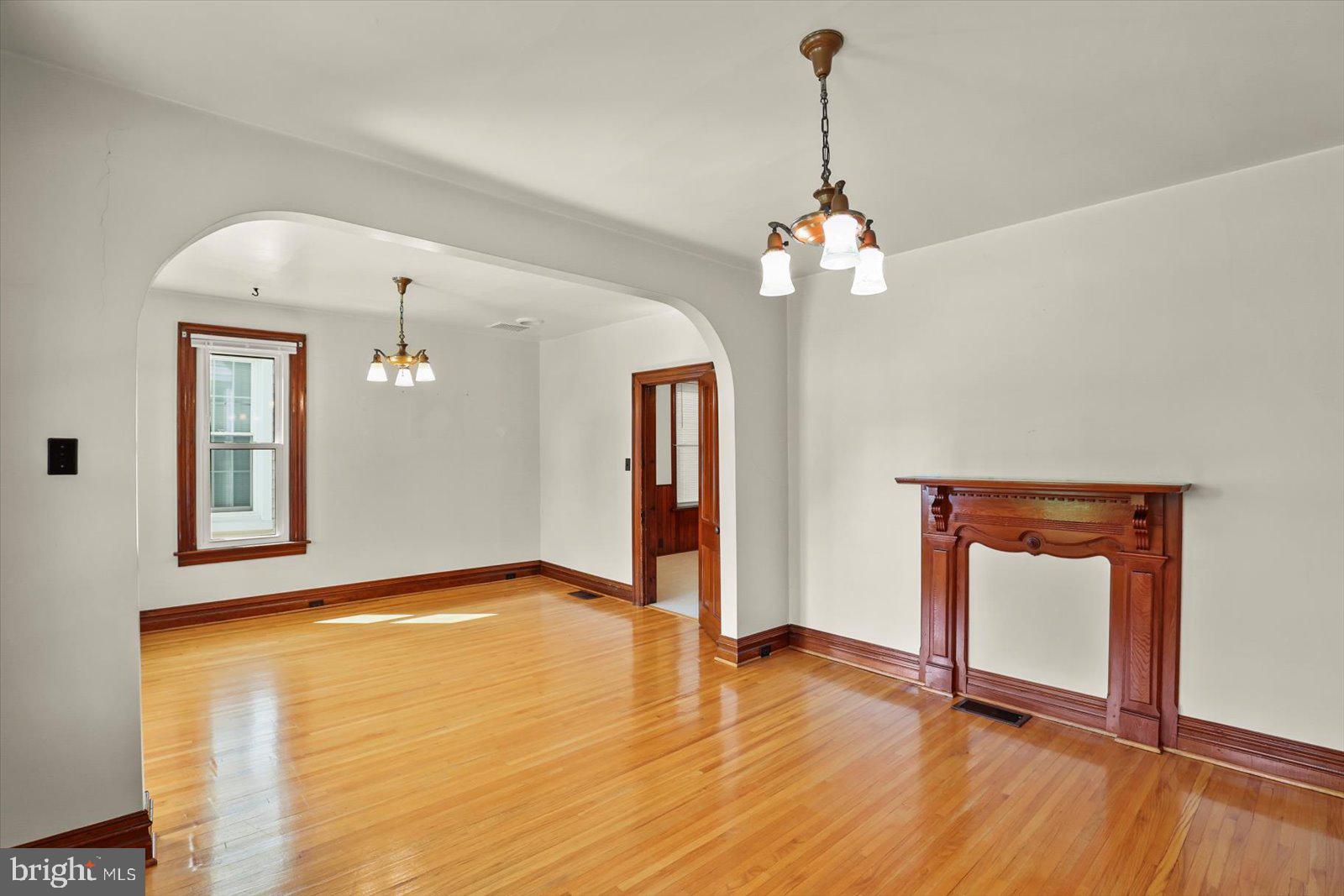 Nestled in the heart of the Conewago Valley School District, this exquisite Colonial-style residence, originally built in 1910 and thoughtfully renovated in 2012, offers a harmonious blend of classic charm and modern luxury. With 1,592 square feet of meticulously maintained living space, this home invites you to experience a lifestyle of comfort and elegance. Step inside to discover a warm and inviting interior, where rich wood floors and tasteful wainscoting create an atmosphere of sophistication. The spacious combination dining and living area is perfect for entertaining, while the kitchen, featuring upgraded countertops and ample table space, is a culinary enthusiast's dream. Natural light pours in through double-hung, vinyl-clad windows, enhancing the home's welcoming ambiance. This residence boasts four generously sized bedrooms, providing ample space for relaxation and personalization. The full bathroom is designed for both functionality and style, featuring a tub shower that invites you to unwind after a long day. Additional interior highlights include ceiling fans for comfort, an attic for extra storage, and modern appliances such as a self-cleaning oven, built-in microwave, and washer and dryer, ensuring convenience at every turn. The exterior of the property is equally impressive, showcasing a well-maintained vinyl siding façade complemented by charming awnings and exterior lighting. The level lot, spanning 0.12 acres, features a rear yard perfect for outdoor gatherings or quiet moments of reflection. Enjoy the fresh air on the patio or porch, ideal for sipping morning coffee or hosting evening barbecues. Parking is a breeze with a detached garage, carport, and ample driveway space, providing both convenience and accessibility. The property is equipped with a comprehensive gutter system and flood lights, ensuring safety and functionality year-round. This home is not just a residence; it's a lifestyle. Experience the perfect blend of historic charm and modern amenities, all within a vibrant community. Whether you're entertaining guests or enjoying a quiet evening at home, this property offers a unique opportunity to create lasting memories in a truly special setting.
