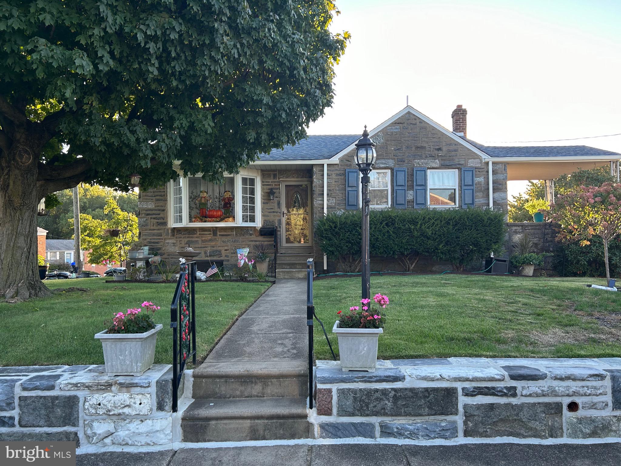 Welcome to 2910 Carnwath St, a rancher in the desirable Lexington Park section of Philadelphia. This unique home is one of the largest in Lexington Park.  This 3 bedroom,  2 full bathrooms and 2 half bathrooms home has hardwood floors throughout, an updated kitchen and large finished basement. With an open floor plan, the living room transitions into the dining room/ kitchen area that has newly installed quartz countertops. The large master bedroom has a newly renovated master bath with standup shower and tile flooring. The large unique middle bedroom features an office space as soon as you walk in with space big enough for a complete bedroom set. The third bedroom has the same space as the middle bedroom and has a half bath. The basement is fully finished with tile flooring and a gas fireplace. The property also has a large laundry room with cabinet space for storage. There is also a half bath in the basement that has two large storage closets, one of which is a cedar closet. Going outback you'll notice a large vinyl pool with a large deck for all of your entertaining needs. The property also has a storage closet out back for outdoor equipment.