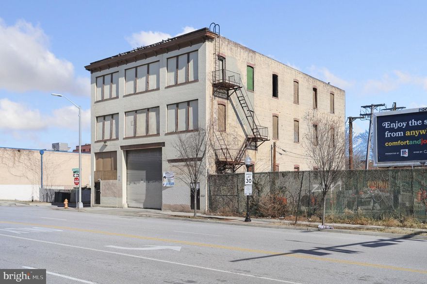 3-story building with a usable basement, fenced parking lot, in addition to street parking. 1 bay door. Renovation needed. Zoned B-2-2 for commercial and/or residential. Mins from Harbor East, Johns Hopkins, downtown, highways. Development in the area. "As is". 
Approx: 13,000  sq ft. Possible Uses: Mixed-use, apartments, offices, warehouse, fitness center, grocery store, restaurant, and much more. Front and Side Entrances.