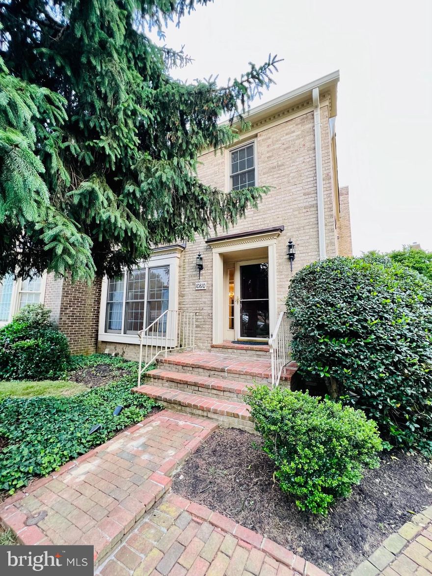 Welcome to this beautiful end-unit townhouse ideally located in desirable Tuckerman Station. Convenient location close to metro, shopping and major routes. The gracious main level has a separate living room, dining room, powder room, updated eat-in kitchen and a lovely family room with fireplace and walk-out to the private brick patio. Wood floors throughout. The upper level offers 3 beds, 2 full baths and laundry. On the lower level there is a large rec room, full bath, bonus room and lots of storage. Pool, tennis and trails are some of the community amenities.