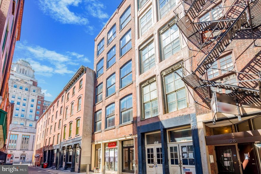 “NEWLY FURNISHED" -be the first to live in this luxurious 1,200 SF, 2-bedroom, 1 bath loft is in a boutique property that was originally an 1850s textile warehouse. It offers private keyed elevator access directly into each unit. Each loft has been modernized to perfection while retaining its historic charm and character, featuring exposed brick walls, cast iron and original timber columns, and original heavy timber beams. New York Design Architects, LLP, an award-winning NYC architecture firm, designed the property.

Each of the units has an en-suite bathroom and walk-in closet. The unit has a virtual doorman, central air conditioning, and radiant heat in the porcelain bathroom flooring. The high ceilings reach 12  feet, and the historic mahogany windows allow ample natural light.

Located in the heart of Old City, the property is steps from Market Street and has easy access to transportation. Its central location makes it convenient for residents to enjoy local amenities and attractions.

 If this becomes your next home 32 Strawberry Street, getting to and from the  Market/ Frankford Lines and SEPTA Station is within minutes. Also, it's less than 7 minutes to the AMTRAK station and 14 minutes to the Philadelphia Airport.  Buses to and from Manhattan are  just as easy, and you are also minutes over the bridge to New Jersey. Outside your door, you can immerse yourself in the rich history this iconic section of Philadelphia offers. You can visit historic Sites such as the Liberty Bell, Independence Hall, Christ's Church, The Betsy Ross House, Penn's Landing waterfront, the Rivers Casino, Philly Tour Buses, and Museums, all in your backyard. 
Excellent shopping, theatre, art galleries, coffee shops,  nightlife, and dozens of restaurants are within walking distance.