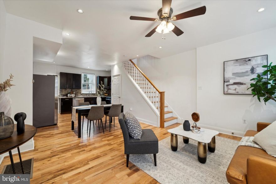 Welcome to  2172 E Sergeant Street, a stunning 3-bedroom, 2-bathroom, 3-story brick-front home located in the heart of vibrant Fishtown. As you step inside, you’re greeted by an open-concept floor plan with beautiful hardwood floors throughout. The spacious living room is perfect for relaxing, watching TV, or entertaining guests in a formal dining setting. The kitchen has been completely remodeled, boasting quartz countertops, a gas range, LED recessed lighting, modern appliances, and a custom tile backsplash. Step out from the kitchen into an expansive backyard, an ideal space for relaxation, outdoor cooking, or hosting gatherings. The yard is fully enclosed, featuring a well-maintained cement slab and a designated area perfect for urban gardening. The basement offers ample storage space, a modern washer and dryer, and features tall ceilings in its unfinished state. Upstairs, you’ll find 3 well-appointed bedrooms and 2 Full remodeled bathrooms with custom tile finishes. The master suite is a true retreat, complete with dual vanities and an impressive walk-in closet. This home is equipped with central air and a smart thermostat, ceiling fans, spacious hallways, and a huge private yard. Additional highlights include a new roof installed in 2021 and an unbeatable location. You’ll be within walking distance to Fishtown’s best restaurants, bars, coffee shops, grocery stores, gyms, dog parks, salons, and more. The street is well-maintained with mature trees, and parking is consistently available and hassle-free. Don’t miss out—schedule your tour today!