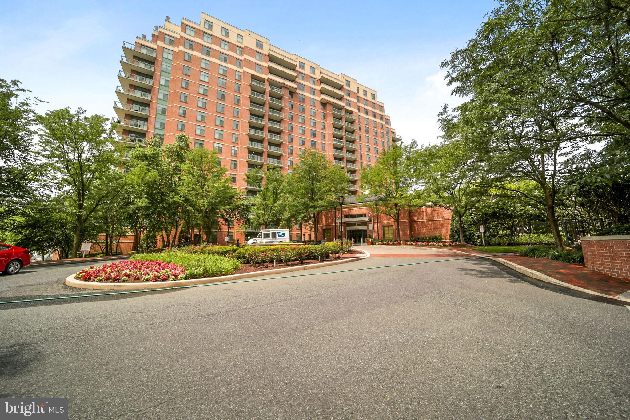 This stunningly bright freshly painted unit is a must-see with an amazing floor plan and spectacular South-West views. The expansive 2-bedroom, 2-bath unit features a beautiful gourmet kitchen with granite counters and stainless steel appliances, a large living and dining room with Brazilian cherry hardwood floors with private double balconies all around, bedrooms with walk-in and ample closet space and attached baths, and an in-unit washer & drier. Walk to White Flint Metro or drive and park in either one of your 2 reserved garage parking spaces. The Sterling Condominium offers a 24-hour front desk, community room with kitchen, fitness center, movie theater room, pool, tot lot, and more. Live just a block from metro and entertainment, walk across to Pike and Rose, and easy access to Downtown Bethesda, NIH, I-270, and the Capitol Beltway. Don't miss this opportunity!