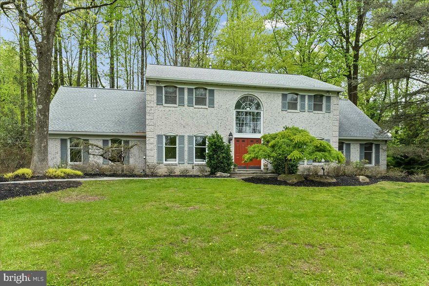 Welcome to 1750 Stocton Road, a stunning white brick colonial nestled on 1.77 acres of parklike grounds in the exclusive enclave of "Pennock Woods." This home is a masterclass in elegance, blending classic architectural allure with sophistication across nearly 3,500 square feet of living space.

Step into the dramatic two-story foyer, where wainscoting creates an atmosphere of refined beauty. Large rooms throughout the home have been designed to elevate your lifestyle, whether hosting intimate gatherings in the heart of the home or enjoying a quiet evening on the serene screened-in porch, enveloped by the tranquil splendor of the surrounding landscape. 

The eat-in kitchen is open to a wood-beamed great room with a cozy fireplace adorned by Mercer tiles. The home office is right off of the great room on the main floor for added convenience, with another gathering room and full dining room overlooking the expansive front lawn.

The home features four large bedrooms, with a primary suite that’s a sanctuary of comfort and indulgence. This just-renovated retreat includes an oversized walk-in closet and a spa-inspired bathroom, complete with a skylight, soaking tub, and an ambiance of serene luxury.

Attention to detail is evident throughout, from the newly installed roof to the practical elegance of the main-level laundry and the attached three-car garage. The garage’s custom drop zone—with hooks and cubbies—offers a stylish solution for effortless organization. Abundant storage throughout the home ensures a clutter-free, harmonious living experience.

Outside, the expansive 1.77-acre lot is a private oasis, offering lush landscaping, an established “food forest” growing a wide variety of native fruits and nuts, a patio with a wisteria-covered pergola for unwinding or entertaining, and a sense of privacy and seclusion. The walkable neighborhood is also close to parks and trails, while the home’s prime location provides effortless access to upscale shopping, fine dining, picturesque parks, train stations, and major thoroughfares such as the PA Turnpike.

This is more than a home—it’s an invitation to embrace the art of refined suburban living. Don’t miss the opportunity to make this extraordinary property in Pennock Woods your own.