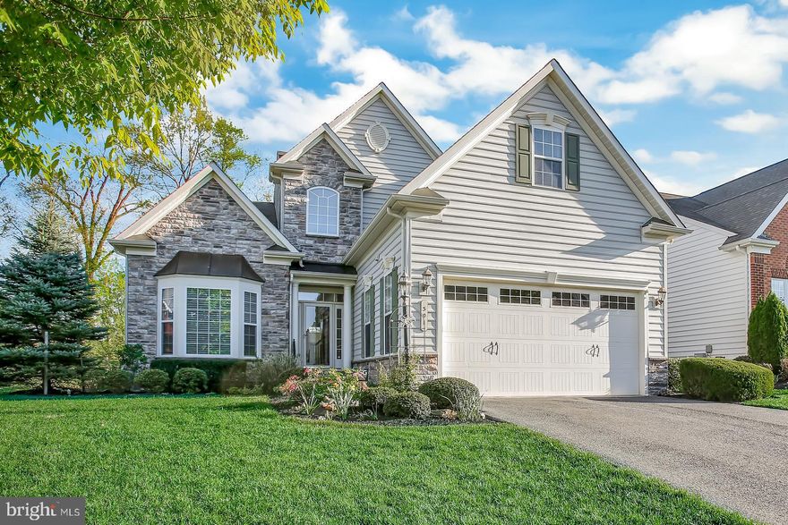 Welcome to 301 Bounding Home Court in the much sought after resort style community of Bulle Rock, in the quaint waterfront town of Havre de Grace, MD. Are you a buyer not easily pleased, knowing that you want close to perfection? Well, this home may be THE one for you. A 3-4 bed, 4 bath home, custom built by NV Homes, sits on a corner lot giving it an abundance of warm, natural lighting. A formal dining room starts the tour inside with its tray ceiling, beautiful columns, crown moldings, and bay window. The gourmet kitchen opening to the great family room takes your breath away. The expansive room with its cozy fireplace and hardwood floors opens (through French doors) to the private back deck. A first floor master with columned sitting area and en suite spa bath say "stress be gone". The second first floor bedroom has its own seated shower full bath. While living on the first floor may seem complete, the upstairs loft with built in shelves and window seat is accompanied by another bedroom and full bath, making it a getaway all its own. But wait there s more! A lower level (in law suite?) with a huge living area, its own fireplace, a separately floored study area, a granite countertop kitchenette, a full bath and a  whatever you want the enclosed area to be -bedroom/office/media room/workout room The attention to detail in this home is monumental. There are no sliders, only French doors; there are delicately small windows at the top of walls for maximum natural light. The openness of the floor plan provides maximum mingling space for family, for entertaining and for wide open living. In many ways it is 3 houses in one because each floor has its own personality but they all blend seamlessly to make an over the top living experience. Oops, did I mention maintenance free living? Grass cutting, landscaping and snow removal are all perks of the community. An indoor and outdoor pool, full gym, billiard room, ballroom, library are at the Resident's Club with the tennis courts just outside. For now I won t mention the golf course and restaurant, come see all this beautiful home has to offer for yourself.