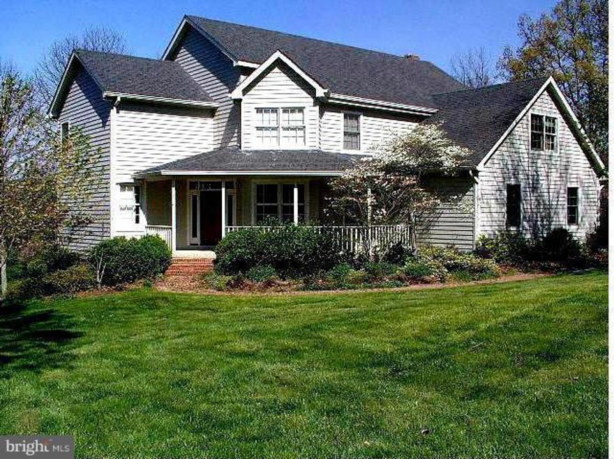 Custom built home near Medical Center, schools & shopping. On 3.3 acres with huge front and back yard, buffered w/mature plantings & trees. 4,000 sq ft with hardwood and ceramic floors. Gourmet kitchen w/SS appliances, huge island, breakfast nook. 1st floor bedroom (now studio) w/full bath. New carpet and refinished hard wood floors. Enormous attic for storage. Double decks w/views. HORSES ALLOWED