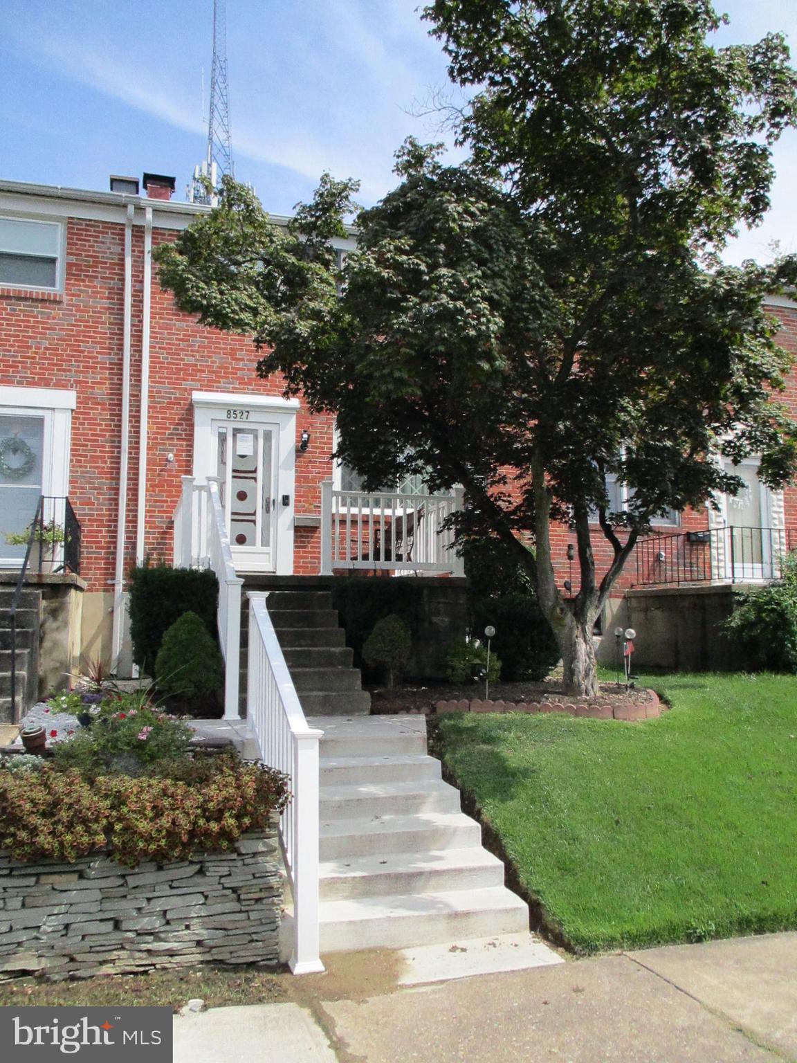 Welcome home to this well maintained 3 bedroom 1 & 1/2 Bath Brick townhouse. Starting with the new steps and concrete work, and inviting front porch with PVC railings and room to sit outside. New Roof 10/2020. Once inside the beautiful hardwood floors welcome you in to this neutrally painted home. The kitchen has tile flooring and backsplash. All kitchen appliances including a wall oven and cooktop stove, dishwasher, microwave, frig recessed lighting, additional shelving and storage. Upper level includes 3 bedrooms and a renovated full bath with a tiled bath surround, tile flooring and new vanity. New pull down stairs to attic with electric lighting. Additional storage/closet area. Lower level has new flooring and a new 1/2 bath including a vanity. storage closet, cabinets, Washer and Dryer. Seller has installed new Security doors and screen doors. Covered patio and Pergola offer additional outdoor entertaining, Amish shed with electric, and off street parking.