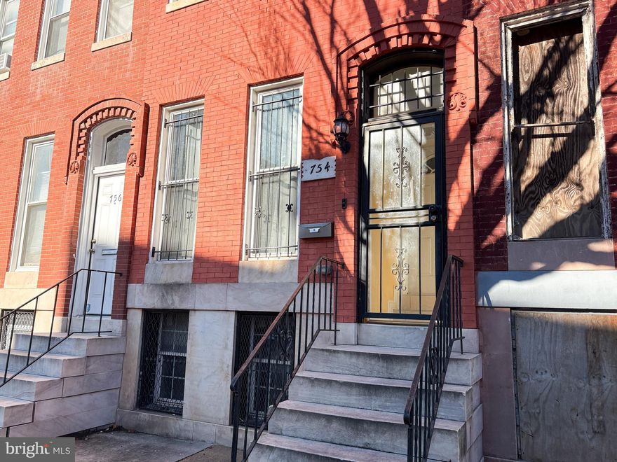 Welcome to 754 Dolphin St, Baltimore, MD!  Well-maintained 5-bedroom, 2 full-bath townhouse offering a spacious layout and recent updates. The home features new windows, a secure front mailroom for package deliveries, new flooring in the bedrooms, and a newly installed rear fence. An energy audit upgrade with R-49 insulation in the attic enhances efficiency and comfort.

A rear parking pad provides added convenience. Generous room sizes throughout and a functional floor plan make this property suitable for a variety of living arrangements. Conveniently located near local amenities, major commuter routes, and public transportation.