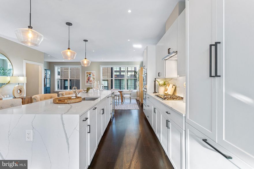 LAST TOWNHOME UNIT REMAINING!! Previously priced at $2,899,900, this is a RARE OPPORTUNITY to own a BRAND NEW SOUTH-FACING CORNER UNIT Townhome with Elevator at VENUE. Built by renowned local developer, Carr Companies, the finishes in this development are extraordinary. Equipped with a luxurious chef's kitchen featuring panelized Thermador and stainless steel Bosch appliances, built-in wine cooler, Upgraded Quartz countertops & backsplash, custom soft-close cabinet drawers/doors, white oak hardwood flooring throughout,  and an in-unit elevator providing easy access to all floors. This SOUTH FACING light-filled, CORNER unit townhome offers 4400 sq ft, has three large bedrooms, three full baths, PLUS two half baths, a gigantic office space, two extra den spaces, a sizable family room loft with direct access to the rooftop terrace, and a massive garage with 12 ft ceilings featuring an Electric Vehicle charging hookup.  All bedrooms include large walk-in closets, offering an abundance of storage within this townhome. The private roof terrace is equipped with a gas line, plumbing line, and electrical so the entertaining possibilities are endless! This unit faces South West which provides INCREDIBLE sunset views, as well as views of National Harbor and the Potomac River from the 4th floor. VENUE is the ideal location in Old Town's most desirable neighborhood, right in the center of entertainment, restaurants, and shopping, just moments away from King Street, GW Parkway, and the Potomac River, with direct access to the Mount Vernon Trail. This is a MUST-SEE TOWNHOME!! Don't miss your opportunity to snag Venue's LAST remaining townhome! Immediate occupancy is available. Come see what all the fuss is about!