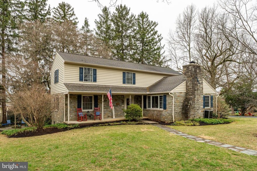 This home is a special find boasting the character and charm of a classic Lancaster home including coffered and cathedral ceilings, 2 wood-burning fireplaces, and hardwood floors, but with all the modern amenities like updated windows and brand new carpet. Nestled in Manheim Township, it offers the perfect blend of privacy and convenience. Thoughtfully expanded by an award-winning contractor for a local builder, it boasts 4 spacious bedrooms, including a 1st floor primary bedroom, and flexibility for a fifth bedroom or office on the first floor. In addition to the living room is a partially finished basement where you can relax or entertain at the beautifully crafted wet bar. The beautifully landscaped backyard and side yard are true outdoor retreats featuring a tranquil fountain, spacious patio, deck, swing, fire pit, stone walls, and multiple seating areas idea for relaxing or entertaining. Conveniently located for easy access to shopping, groceries, and highways.
