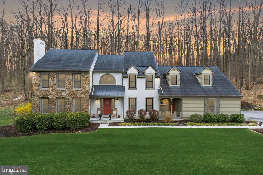 You’ll fall in love with this Glenmoore  Semi Custom 4 Bedroom home on 5.2 acres, nested in a private community of 17 properties. As you enter, you’ll be welcomed by hardwood floors and a turn style wood staircase flanked by the living room w/wood burning fireplace and formal dining room.  The impressive family room boasts vaulted ceiling w/ skylights, wood flooring, and a floor to ceiling real stone fireplace with wood stove insert. The large windows bathe this space in natural light while offering tranquil views of the surrounding landscape.  The modern kitchen features a breakfast area, soap stone counter tops, farmhouse sink, wall mounted double oven, cook top and decorative iron pipe shelving over the coffee bar. The spacious laundry room is conveniently located on the main floor along with the recently updated powder room and a first-floor office.  Upstairs, the primary suite provides for a relaxing retreat with walk-in-closets and en-suite bathroom w/soaking tub and glass enclosed shower. The three generously sized additional bedrooms share the double sink center hall bathroom.  The third bedroom is huge and could be used as an upper great room. Outside, enjoy the peaceful setting of your private partially wooded lot, with room for a future pool or vegetable garden. The expansive backyard offers endless possibilities for entertaining or relaxing. Additional highlights include paver brick patio slate patio w/fire pit, genuine Pennsylvania field stone exterior, natural stone garden walls, replacement windows 2022 , New Septic 2026, New A/C Compressor, and the American Preferred Home Warranty for the buyers!   The community HOA fee is $350 a year, and amenities include tennis and pickle ball courts, walking trails, and fishing pond.  This serene setting offers tremendous  privacy yet has the convenience of Shopping and Restaurants  of Exton, and close to major  routes- like PA turnpike & route 100. This Glenmoore Gem is a rare find!
