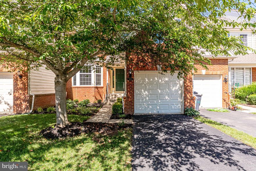 Don’t miss your chance to own one of the most charming and fully remodeled  model townhomes in the award-winning, gated golf community of Dominion Valley Country Club. From the basement to the roof, this luxury residence has been thoughtfully updated, offering three fully finished levels, 3 bedrooms, 3.5 baths, and 2, over 3200 square feet of modern living space. With its bay window, one-car garage, and extensive upgrades throughout, this home is a rare opportunity in one of Northern Virginia’s most sought-after communities.
This beautifully remodeled townhome in Dominion Valley Country Club shines from top to bottom, offering stylish updates and inviting spaces across all three levels.
The main level is bright and welcoming, with formal living and dining rooms at the front and a spacious kitchen and family room toward the back. Included is a custom built main level office and mudroom* A Palladian window fills the kitchen with natural light, while beautiful updated cabinetry provides abundant storage and room for a breakfast table. Step out from the kitchen to the main deck—perfect for morning coffee, casual dinners, or simply enjoying the gorgeous park like backyard.  Upstairs, the primary suite features a walk-in closet and a private bath with dual sinks, soaking tub, and separate shower. Two additional bedrooms share a full bath, and the laundry is conveniently located on this level. The finished walk-out lower level expands your living space with a large recreation room, full bath, and custom closet system—ideal for guests, hobbies, or a home office. Storage is plentiful, with a mechanical room. Outside, the backyard offers a shady retreat under deck for relaxing.
Recent updates include all 3 levels - Completely remodeled in 2021 including HVAC, Water Heater, All Kitchen Appliances, Flooring, Bathrooms! New Roof 2024!
Dominion Valley Country Club is one of Northern Virginia’s premier gated, resort-style communities, offering an unparalleled lifestyle surrounded by natural beauty and modern conveniences. At the heart of the neighborhood is the Arnold Palmer Signature golf course, complemented by a newly renovated clubhouse, sports pavilion, fitness center, and both indoor and outdoor pools. Residents enjoy tennis and pickleball courts, basketball courts, sand volleyball, playgrounds, walking trails, and stocked fishing ponds—making it easy to stay active and connected.
Beyond the amenities inside the gates, Dominion Valley is ideally located with easy access to major highways including I‑66, Route 29, Route 50, and Route 15, simplifying commutes and travel. Everyday conveniences are right at hand, with nearby restaurants, grocery stores, and gas stations ensuring you never have to go far for dining, shopping, or essentials. Highly rated schools are located within the community, adding to its appeal for families.
Living in Dominion Valley Country Club means enjoying a vibrant, active lifestyle with everything you need—from recreation and relaxation to shopping and commuting—just minutes from your front door.