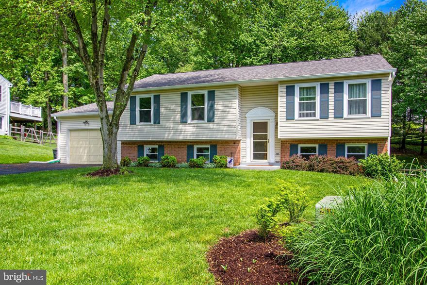 MUST SEE! This bright and beautiful, meticulously maintained 5 bedroom, 3 full bath split foyer single family home is nestled at the end of a cul-de-sac. Boasting a brand new roof, gutters and gutter guards, hardwood floors throughout the main level and remodeled bathrooms - this home won't last long! Step out from the dining room onto a wooden deck overlooking a large fully fenced backyard - perfect for entertaining. The oversized garage can also be used as a workshop. Minutes from the center of Damascus, this location is convenient to shopping and public transportation.