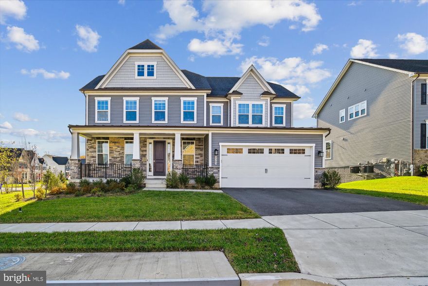 Welcome to 3505 Traynor Lane, an NVHomes Longwood model, in the prestigious Westmount community of Ellicott City. Tucked away in a peaceful enclave surrounded by tranquil forest conservation, this stunning single-family home perfectly balances elegance and modern comfort.
As you step inside, you’re greeted by a sophisticated formal dining room, ideal for hosting memorable gatherings. The gourmet kitchen is a culinary masterpiece, featuring Kinsdale cherry slate cabinets, Carrara Morro quartz countertops, and a chic Lucente Glass Morning Fog tile backsplash. The oversized infinity island, illuminated by gorgeous silver global pendants, opens to the dinette and inviting family room, creating a warm, open-concept living area that’s perfect for both daily living and entertaining.
The main level also offers a private study, ideal for working from home, and convenient access to the 2-car garage. Upstairs, each spacious bedroom includes a walk-in closet and access to a full bath. The luxurious owner’s suite is a true sanctuary, boasting two expansive walk-in closets, a cozy sitting area, and a spa-like bath with dual vanities, Bianco Diamante granite countertops, and porto white ceramic tiles. Just outside the master suite, you’ll find a well-appointed laundry room with tahoe maple expresso cabinets and frost white countertops, making laundry day a breeze.
The finished basement provides even more living space, offering versatile flex space that can be tailored to your needs—whether it’s a home gym, playroom, or media room.
Located near Glenelg High School and just minutes from shopping, dining, and recreation, with easy access to major roadways, this home offers the perfect blend of luxury, convenience, and natural beauty. Make this remarkable property your own today!