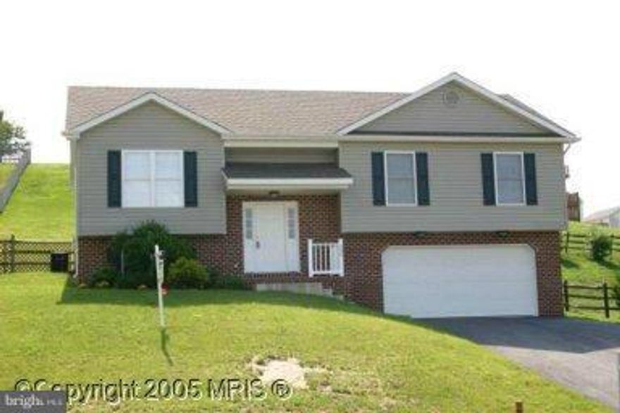 Terrific home in Summer Hill subdivision.  Town water and sewer but away from the hustle and bustle.  Enjoy the warm colors and gas fireplace in this 3 bedroom, 2 1/2 bath home. Large kitchen, finished lower level with family room and wet bar, half bath in lower level and 2 car garage with remote. Available immediately!