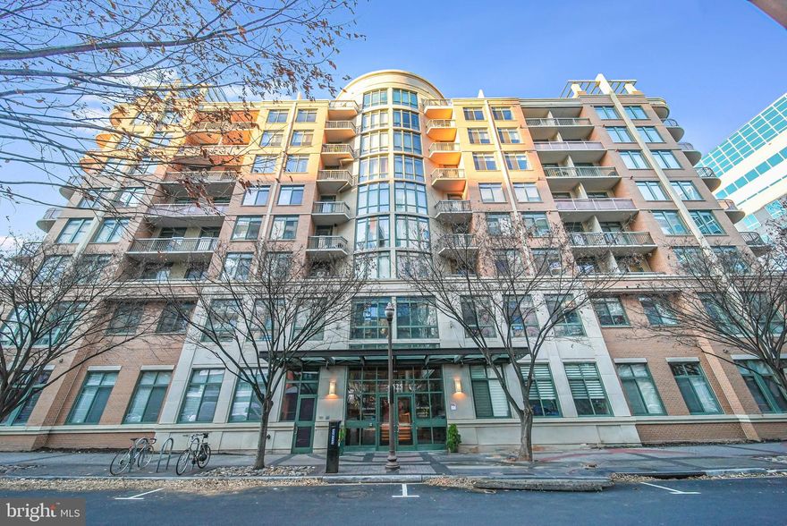 Welcome to Unit 507 at The Monroe, a 3-bedroom, 2-bath spacious corner unit located on the 5th floor with breathtaking views of Quincy Park and the Central Library. This sun-soaked residence boasts an abundance of windows, filling every room with natural light.

Step into the heart of the home—an updated kitchen featuring brand new Stainless Steel appliances (2023), elegant white quartz countertops, fresh subway backsplash, a deep farm sink, and a generously sized pantry. The bonus rolling island that conveys adds additional counter space and flexibility. The open living and dining area create a welcoming space for both relaxation and entertainment.

With three bedrooms and two full baths, this condo offers comfortable living. The Primary Suite offers an abundance of space, ample closet space, and a private balcony. Complete with a newly remodeled bathroom (2022), featuring a marble-tiled shower with a frameless glass door. A large vanity with tons of storage, paired with quartz countertops and brushed nickel accents, makes this bathroom breathtaking. Two additional bedrooms provide versatility in the space with another flawlessly updated full bathroom. All flooring was tastefully redone in 2021, providing a modern and cohesive look throughout.

Additional features include a new washer and dryer installed in 2022, a tankless hot water heater, and an assigned parking space for your convenience.

The Monroe not only offers a luxurious living space but also provides a host of community amenities, including a gym, library, party room, concierge services, and more.

Convenience is key, sitting just one block away from the Virginia Square Metro station and Starbucks, ensuring easy access to transportation, as well as being a block away from Giant. Minutes away from an abundance of shopping, fitness facilities, restaurants, and activities.