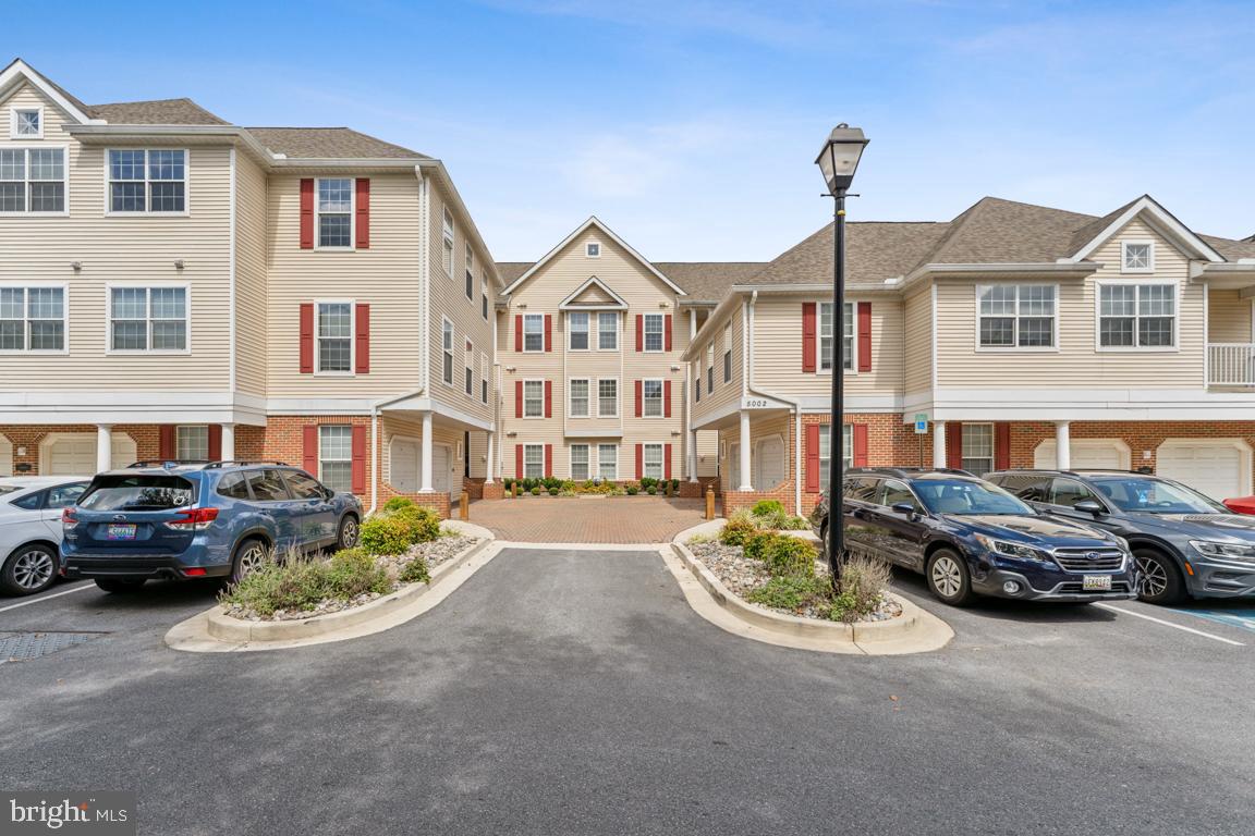 Discover the charm of this delightful penthouse unit nestled in the serene Hollington section of Owings Mills New Town. The open-concept layout, vaulted ceilings, cozy gas fireplace and ample natural lighting create the ultimate retreat. Enjoy the convenience of in-unit washer and dryer. With amenities like tennis courts, 3 outdoor pools, walking paths, playgrounds and direct access to the Red Run Stream Valley Trail, which leads to Soldier’s Delight Natural Area, there's something for everyone to enjoy. Easy access to I-695 and I-95, experience the perfect blend of comfort and community in this lovely home—your oasis awaits! Newer GE appliances and brand new water heater.