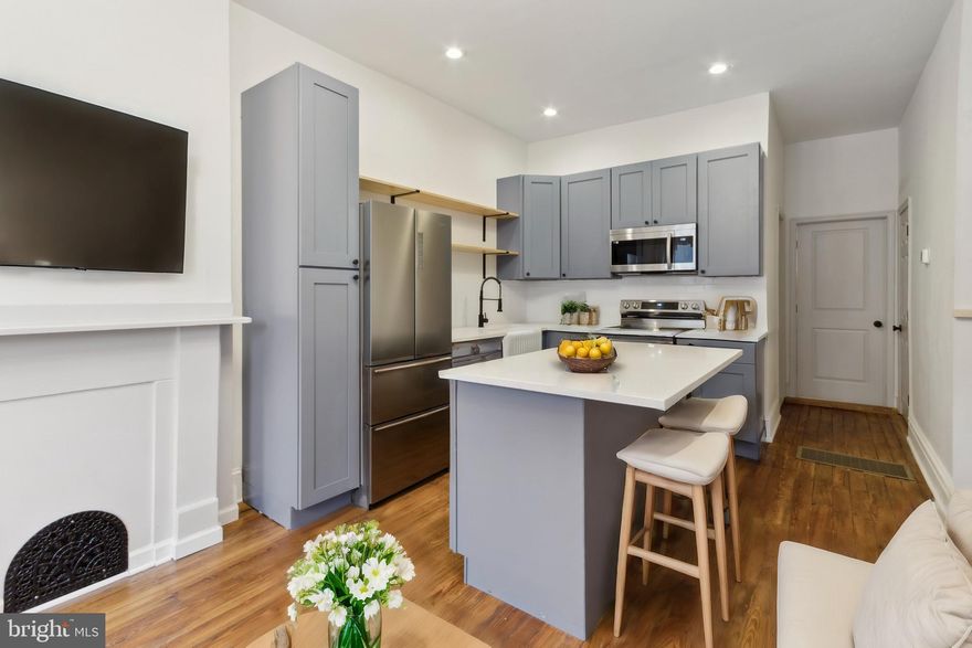 Welcome to this beautiful 4-bedroom, 2-bathroom house situated on the serene 20th block of Gratz Street. This move-in-ready home greets you with a well-lit living room and a modern kitchen featuring an electric stove and dishwasher, perfect for entertaining friends and family. On the first floor, you'll find a convenient full bathroom and a bedroom with direct access to the backyard—ideal for summer BBQs. Optimize your living space by transforming the lower-level bedroom into a den! Upstairs, there are three additional bedrooms and another beautifully renovated bathroom. The primary bedroom offers a spacious closet and abundant natural light.  The neighborhood is known for its strong sense of community, supported by an attentive block captain. You'll be just an 8-minute walk from SEPTA and Rite Aid, and Temple University is a quick 7-minute walk straight ahead from Norris Street. Additionally, there's a charming mom-and-pop store right in front of the house. Don’t miss this opportunity—contact us today to schedule a tour!