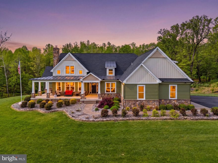 Open House Cancelled. Set on nearly 20 picturesque acres, this exceptional estate offers a rare blend of refined living and premier equestrian amenities. Thoughtfully designed and impeccably maintained, the property offers 6395 square feet and delivers both everyday comfort and unforgettable entertaining spaces.
From the moment you arrive, the home’s welcoming presence stands out, with a wraparound front porch perfect for quiet mornings and sunsets. Inside, the main level is anchored by a stunning living room featuring a cathedral ceiling with wood accent detail and a striking stone fireplace, creating a warm yet sophisticated gathering space.
The kitchen is equally impressive, designed for both function and style, with leathered granite countertops, stainless steel appliances, double ovens, a cooktop, generous bar seating, and a spacious dining area. Just off the kitchen, step out to a Trex deck with a covered section, ideal for seamless indoor-outdoor living.
The main-level primary suite is a true retreat, offering a spa-like bathroom with a custom tiled walk-in shower, soaking tub, double vanity, and a beautifully designed walk-in closet system. The primary suite also has its own private balcony. A dedicated main-level office, a large laundry room with a custom dog-wash station, and an oversized walk-in pantry add to the home’s thoughtful design.
Upstairs, you’ll find additional spacious bedrooms, including a private upper-level suite with its own full bath.
The fully finished walkout basement is an entertainer’s dream, filled with natural light and featuring a massive recreation area, custom bar, home gym, fifth bedroom, full bath, and even a hidden walk-in safe. Step directly outside to your backyard oasis.
Outdoors, the amenities are nothing short of incredible. Enjoy the in-ground pool surrounded by travertine tile, complete with a pool house (with future bar potential) and a 10-foot electric awning for shaded relaxation.
For equestrian or hobby enthusiasts, the property is unmatched:
85x40 detached building with extended 45’ bay—perfect for RV or “bus” storage
50x35 barn
240x100 riding arena
Dry lot and additional outbuildings, including a structure with a mini-split system ready for a future dog run!
3-car attached sideload garage! In-ground saltwater pool. 16x36, 3 ft to 8ft. 

This is more than a home, it’s a lifestyle. Private, expansive, and beautifully appointed, this one-of-a-kind property offers the space, flexibility, and luxury rarely found in a single offering.