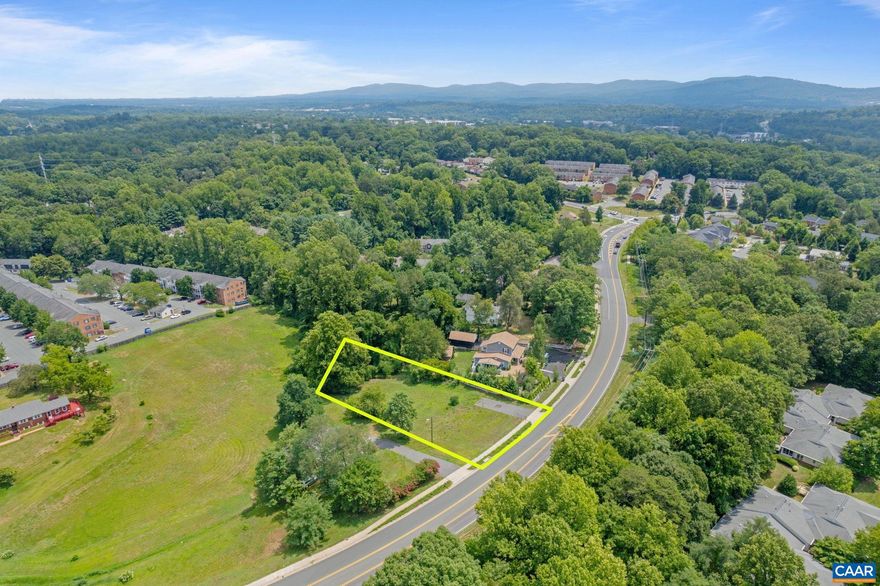 Nestled adjacent to the development areas of Albemarle County this lot presents an exceptional opportunity in a prime location. Spacious lot offers a perfect canvas for your vision, whether it?s building a dream home or possibly establishing a business with prime road frontage. Zoned rural but could possibly be approved for a special use permit due to proximity to county infrastructure, this parcel provides flexibility for various endeavors. With essential utilities readily available at the street including water, electricity, and sewage, the groundwork is laid and ready for your improvements. Driveway already installed.  Nearby attractions such as Barracks Road, Stonefield and the University of Virginia, enhance the property?s value.  Location with proximity to everything Charlottesville cannot be beat.