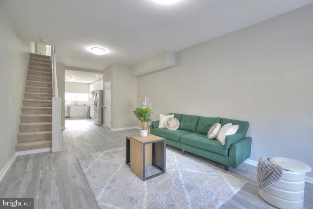 Welcome to 429 N Lakewood Ave, Baltimore, MD 21224!
Beautifully updated and perfectly located, this 3-bedroom, 3.5-bath rowhome offers modern comfort just steps from Patterson Park and minutes from Johns Hopkins Hospital.
Step inside to discover an open-concept main level filled with natural light, featuring upgraded flooring, fresh paint, recessed lighting, and a spacious kitchen with granite countertops, stainless steel appliances, and custom cabinetry. Perfect for hosting or relaxing, this space flows effortlessly into the dining and living areas.
Upstairs, you'll find three generously sized bedrooms, each with access to a full bathroom, including a spacious primary suite with a luxurious ensuite. A rare bonus for city living—the laundry room is conveniently located upstairs, adding ease to your daily routine.
The fully finished basement offers flexible space for a home office, gym, guest suite, or entertainment area, complete with a third full bathroom.
Located in the heart of East Baltimore, this home offers quick access to some of the city’s best lifestyle perks. Enjoy the green space and year-round events at Patterson Park, or explore nearby neighborhoods like Canton, Fells Point, and Harbor East for shopping, dining, and waterfront charm. Food lovers will appreciate the easy access to top local spots like Verde Pizza, Clavel Taqueria, Blue Moon Café, and the Northeast Market for fresh eats and cultural favorites.
Commuters will love the proximity to I-83, I-895, and I-95, making it easy to get around the city or head into D.C. or Philly.
Whether you’re a professional, investor, or first-time buyer, this move-in ready home offers city living at its best.
Don’t miss this incredible opportunity—schedule your showing today!
