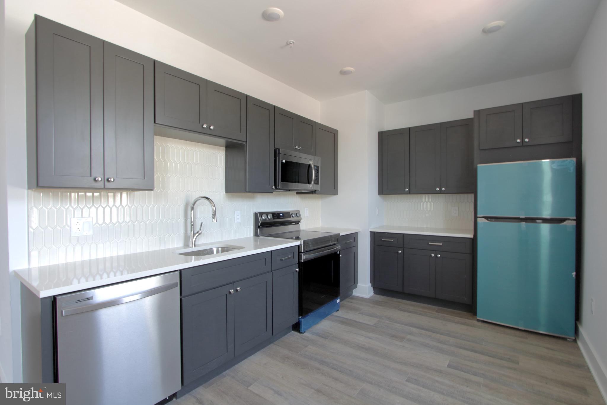 Welcome to our stunning brand-new luxury building, completed in 2024, offering 35 modern and beautiful units. Our units have been designed with attention to detail by our in-house design team, featuring sleek finishes that are sure to excite you.
The open floor plans are thoughtfully laid out, creating an inviting and spacious atmosphere. Our state-of-the-art kitchens feature upgraded appliances, perfect for whipping up a fantastic meal. Large windows throughout the unit, you'll enjoy plenty of natural light, creating a warm and inviting ambiance.
Located in the bustling neighborhood of Frankford. Steps away from Frankford Transportation Center, Jefferson Frankford Hospital, Shops, Clothing boutiques and more! Residents can easily get around Philadelphia and all the surrounding areas. Truly a place to call home. Come experience luxury living at its finest in our gorgeous new building.
**Photos of similar unit and the building