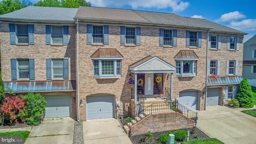 Welcome to this beautiful Pike Creek Valley townhome, where timeless design and thoughtful details come together effortlessly. From the moment you enter, you’ll appreciate the solid oak hardwood floors, impressive millwork, and custom raised-panel wainscoting that add warmth and character throughout. The traditional dining room flows seamlessly into the main living areas, creating an ideal space for both everyday living and entertaining. Spacious and bright, the family room features a cozy Vermont Casting gas fireplace and offers dual access to the rear deck, complete with a retractable awning and overlooking a beautifully manicured yard perfect for relaxing or hosting guests. Upstairs, you’ll find two generously sized bedrooms, each complete with its own full bath featuring Stone countertops, providing both comfort and privacy. Ideally located near shopping, dining, and major attractions, this home offers convenience without compromising charm. A truly beautiful home in the heart of Pike Creek Valley—don’t miss this opportunity!
