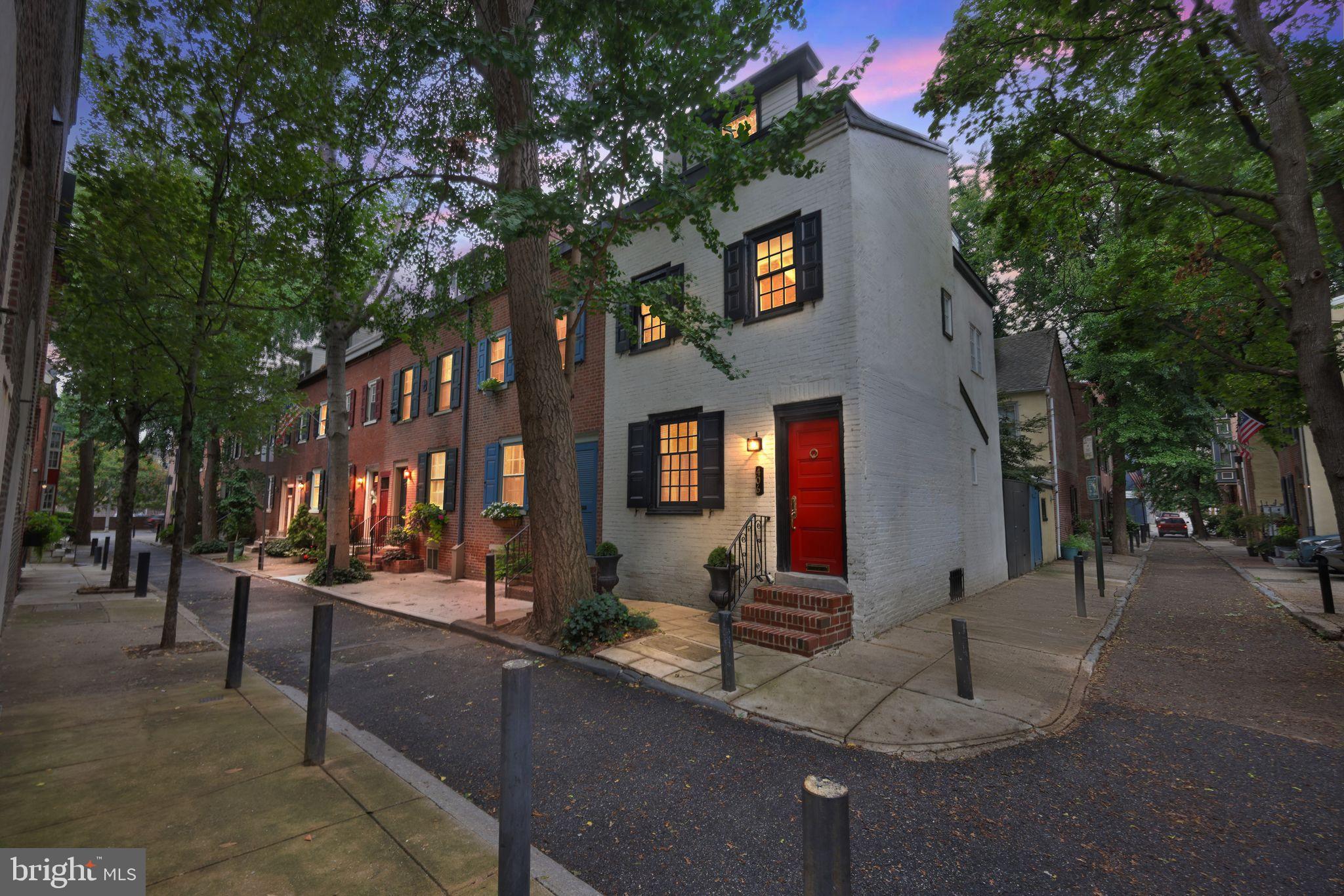Perfectly situated on the idyllic corner of Camac street and Waverly street, is this thoughtfully redesigned, expanded three-story brick townhome offering the perfect blend of historic character and modern updates-right in the heart of Washington Square West. Spanning approximately 1,148 square feet, the home features three bedrooms and a renovated full bathroom. Step inside to a spacious first-floor living room with a cozy wood-burning fireplace, rich hardwood floors, and elegant built-ins. Just beyond, the oversized eat-in kitchen boasts handsome cherry cabinetry, Corian countertops, stainless steel appliances, and direct access to a private patio—ideal for entertaining or unwinding at the end of the day. Up the charming box-winder staircase, the second floor hosts two large bedrooms separated by a full bathroom. The third floor is a light-filled, open space with soaring ceilings and large windows, perfect for a primary suite, home office, or creative studio. The lower level offers a full height basement with laundry facilities, mechanicals, and abundant storage. All this, just steps from Seger Park, Whole Foods, Antique Row, PATCO, Jefferson and Pennsylvania Hospitals, and an incredible selection of restaurants—close to it all, yet tucked away from the city's hustle and bustle.