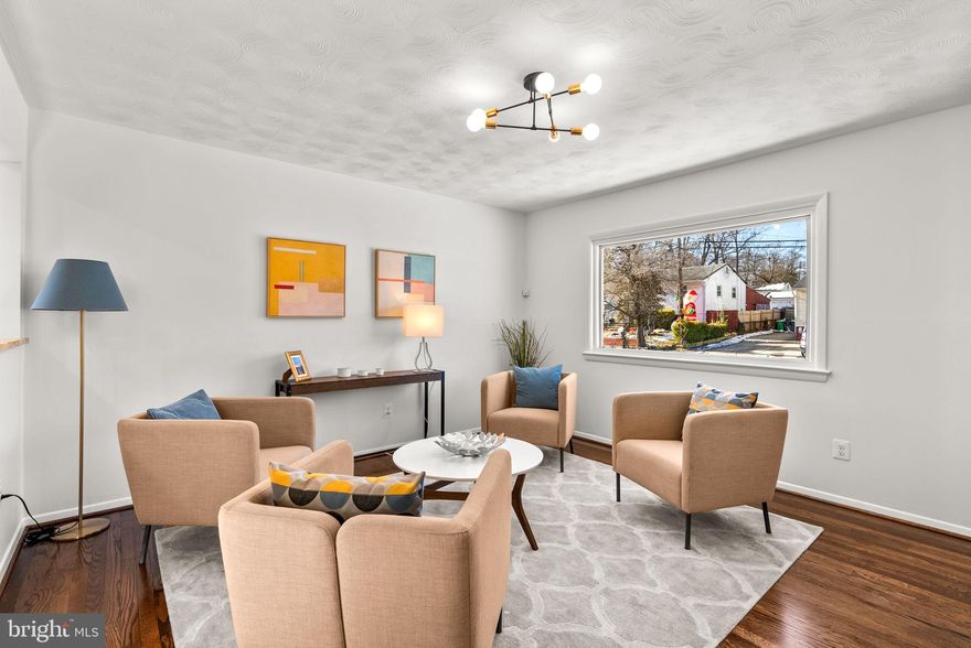 Back on the market.  Buyer didn't have down payment.  Welcome to this tastefully renovated 3-bedroom, 1.5-bath split-level home, conveniently located near major commuting routes and shopping. The main level offers a light-filled living room with newly refinished hardwood floors and an eat-in kitchen featuring granite countertops and brand-new stainless-steel appliances.  The upper level includes the primary bedroom, two additional bedrooms, and a full bathroom, all with newly refinished hardwood floors throughout. The lower level provides an expansive recreation room and a convenient half bath.  Ideally situated within a short walk to James McHenry Elementary School and just minutes to the I-495 / MD-450 intersection, shopping and key commuter routes. Owner is a licensed Realtor.