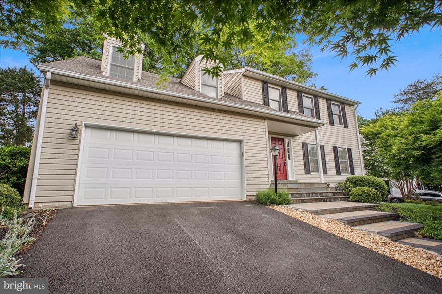 Welcome to this beautifully maintained, single-family home in Reston! Featuring  a two car garage, 4 spacious bedrooms and 2.5 bathrooms. The main level has an open and welcoming floor plan.  The kitchen features granite countertops, stainless steel appliances, and an eat-in dining area .  It is open to the family room with brick hearth and fireplace.  The family room and kitchen get pleinty of natural sunlight - there is a sliding glass door to a large deck and backyard—perfect for outdoor dining, play, or gardening. This level also features a formal living room and dining room with an updated chandelier.  Upstairs has four bedrooms - the large primary bedroom offers a peaceful retreat (even space for a sitting area) with beautiful dormers and an updated en suite bathroom. Three additional bedrooms share a well-appointed hall bath—one of which enjoys direct access, creating an en suite-style room.  The lower level has a finished basement which can be a second TV area, recreation room, home gym or home office. There’s also a spacious unfinished section for ample storage.   Recent Updates Include: Water Heater (2024) Electrical Panel (2024) HVAC (2014) Siding (2019) Roof (2007) Carpeting on main/upper level (2025) Whole house interior paint (2025).  Enjoy easy access to Reston’s extensive network of trails, lakes, parks, and pools, as well as Reston Town Center’s shopping, dining, and entertainment options. Commuters will appreciate proximity to Metro’s Silver Line, Route 267, and Dulles Airport.  LAKE ACCESS!