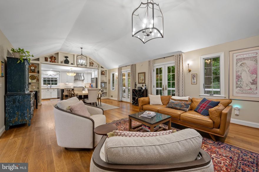 Incredible Value and rare offering in one of Baltimore County’s most sought after neighborhoods!  Welcome to this peaceful retreat where nature, comfort, and modern luxury blend seamlessly. Nestled in the heart of Ruxton, this 4-bedroom, 3½-bath home offers a private, sun-filled sanctuary with effortless access to shopping, dining, hospitals, and major roadways.
This home radiates warmth and character... Walls of windows frame beautiful natural views, filling each room with soft, golden sunlight throughout the day. Thoughtfully updated with fine craftsmanship and elegant design, the open, flexible layout makes it easy to relax, entertain, and enjoy every season.
At the heart of the home, a gorgeous designer chef's kitchen shines with a large walk-in pantry, custom cabinetry, quartz counters, and high-end appliances—including a JennAir 6-burner gas range and GE Café refrigerator and dishwasher. The kitchen flows effortlessly into the dining and living areas, where a floor-to-ceiling stone, wood-burning fireplace invites cozy evenings with friends and family on crisp fall and winter nights. Seamless Indoor/Outdoor Living… step outside to a new 400 sq. ft. composite deck—perfect for morning coffee or sunset dinners surrounded by trees and birdsong.
A versatile main-level en suite bedroom or private office offers serene views and opens directly to a stone patio and hardscaped yard, ideal for year-round entertaining.
Upstairs, the primary suite feels like a retreat among the treetops, with vaulted ceilings, an accent beam, custom built-ins, multiple closets—including a walk-in—and a spa-inspired bath with dual vanities, soaking tub, separate shower, and radiant heated floors.
The fully renovated lower level doubles the living space and adds another gathering area around a second floor-to-ceiling stone, wood-burning fireplace—a perfect spot for movie nights or fireside conversations. This level also includes a wet bar, two additional bedrooms, full bath, walkout to the patio, and a beautifully finished laundry room (2022).
Extensive updates include a full basement renovation with wet bar (2021), new composite decks and stone patio (2022), new water heater (2022), roof and gutters (2023), and new well pump, storage tank, and plumbing (2024)—making this home truly turnkey.