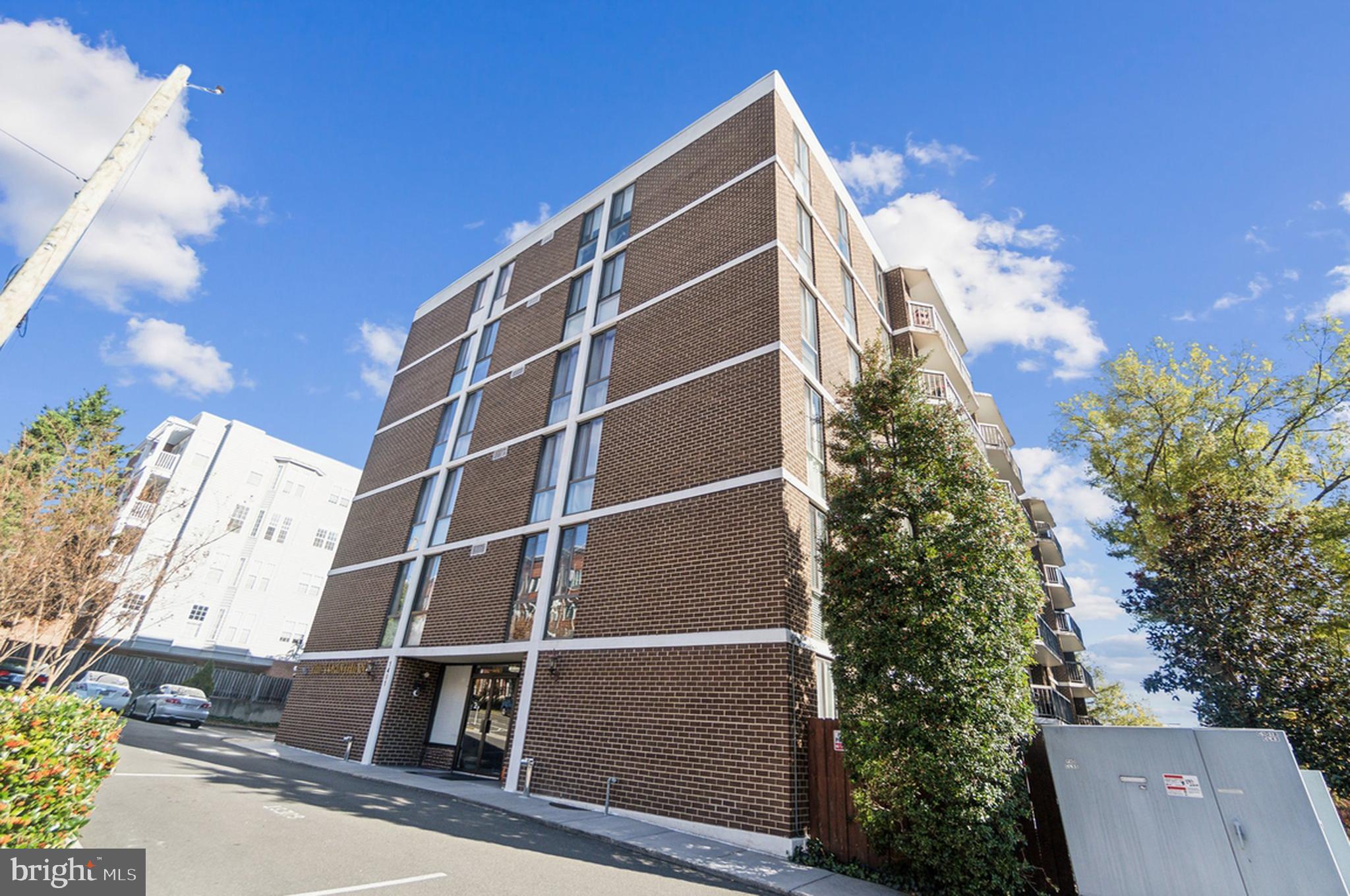 LIMITED TIME OFFER: Seller is contributing $5,000 toward buyer’s closing costs — making this incredible home even more attainable! Turn-Key Corner Condo in Prime Courthouse Location – Fully Renovated & Move-In Ready
Welcome to your sun-drenched urban retreat at The Corinthian—a rare, spacious 1,173 sq. ft. corner condo that’s just undergone a complete top-to-bottom renovation. Tucked away in the highly sought-after Courthouse neighborhood, this hidden gem offers upscale living without the sky-high price tag or excessive condo fees.
Modern Style Meets Everyday Comfort
From the moment you step inside, you’ll notice the fresh, contemporary vibe of this meticulously renovated home. The wide foyer opens to brand-new luxury vinyl plank flooring and flows seamlessly into an open-concept living space bathed in natural light. Walls are freshly painted in custom Sherwin Williams’ White Snow, while modern recessed lighting and updated fixtures add warmth and elegance throughout.
The chef-inspired galley kitchen is a showstopper, featuring sparkling white granite countertops, crisp white cabinetry with stylish hardware, and brand-new stainless-steel appliances. Acoustic ceiling panels add a touch of sophistication and sound-dampening comfort. A dedicated breakfast nook or bar seating area offers the perfect spot for casual meals.
Flowing effortlessly into the spacious dining and living areas, the layout is perfect for entertaining or relaxing at home. Step through the oversized sliding glass doors onto an extended private balcony—ideal for sipping your morning coffee or enjoying evening city views.
Flexible Space with Room to Grow
This thoughtfully designed 1-bedroom, 1.5-bath condo lives large, with generous storage, including multiple hallway closets. The half bath is cleverly combined with a full-sized washer/dryer and new vanity for added convenience. The primary suite offers a tranquil escape, complete with large windows, brand-new blinds, dual closets, and a refreshed en-suite bath with new vanity, sink, and reglazed tile.
Plus, similar units in the building have been successfully converted into legal 2-bedroom homes—an easy upgrade that adds instant value and versatility.
Everyday Convenience & Thoughtful Amenities
Enjoy the ease of an assigned parking space, additional storage bin in the building, and low condo fees that include water, sewer, and trash. This home is truly move-in ready with nothing left to do but unpack.
Unbeatable Location in the Heart of Arlington
Live steps from everything—Trader Joe’s, Whole Foods, Target, cafes, boutiques, and an abundance of dining options. Courthouse, Clarendon, and Rosslyn Metro stations are all within easy reach, and major routes including I-66, Route 50, I-395, and I-495 make commuting a breeze. You're just minutes from the Pentagon, Fort Myer, Amazon HQ, Reagan National Airport, Georgetown, and DC’s iconic landmarks.
Scenic Surroundings & Vibrant Lifestyle
Enjoy the best of Arlington’s charm and natural beauty with nearby trails, parks, and waterfront views. Stroll to the Marine Corps Memorial, or unwind with a jog along the Potomac, all while enjoying stunning skyline views.
Don’t Miss Out!
This rare, fully renovated corner condo offers the perfect blend of style, space, and location. Schedule your private tour today and discover why The Corinthian is one of Courthouse’s best-kept secrets.