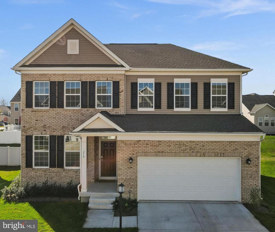 Why wait for new?!  This wonderful home is just over a year old and still holds the original builder warranties.  The home is clean as can be and hardly lived in.  All low maintenance hard surface flooring on main level and fully upgraded gourmet kitchen.  The Large Living Room sits right off the kitchen which features a huge island for added stool space.  Formal Dining Room and Office are off the foyer.  The Primary bedroom has an enormous walk in closet and large bedroom space.  All secondary bedrooms are very large.  The fully finished walk up basement adds to your square footage with a full bath and fifth bedroom in lower level.  Just a couple blocks from the community pool coming soon and minutes from all commuter access makes this location ideal.