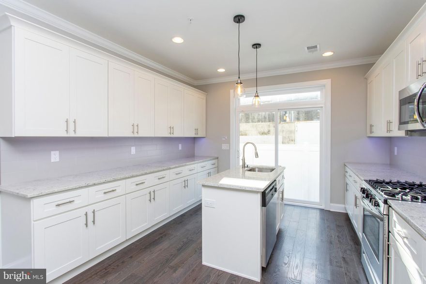 A beautiful new-construction home in one of Philly's hottest neighborhoods! Found on a quiet block, you'll be just a short trip to Center City & walking distance to Bok Bar!!! Enter through the front door into the perfect open floor plan starting in the living room and flowing into the dining room, kitchen, and rear yard- the perfect layout to entertain. This home also features a fully finished basement, hardwood flooring, upgraded bullnose corner walls, recessed lighting, new larger window design, Edison light bulbs to add character to the space, wired security system with Ring Doorbell, & Nest Thermostat! The newly designed kitchen, complete with granite counters, under cabinet lighting, stainless steel appliances, tiled backsplash and three sets of kitchen cabinets for plenty of preparation space, gives you access through sliding doors to a concrete rear yard, perfect for lounging on sunny days. The second floor features two light-filled bedrooms with ample closet space, and a full-tiled shower. The third floor reveals a fabulous master suite with trey ceilings, ambiance rope lighting, a full bath with stall shower with a frameless glass enclosure. Be sure to stop by the 3rd floor's wet bar before heading up to the full sized roof deck with built in speakers and tons of lighting. This is just the spot to sit back and admire the fantastic view! Check out our similar listings, 525 Dudley, 721 Winton St & 627 Cantrell, just a few blocks away! This property qualifies for a special mortgage program 3% down, NO Mortgage Insurance, lower than conventional interest rate.