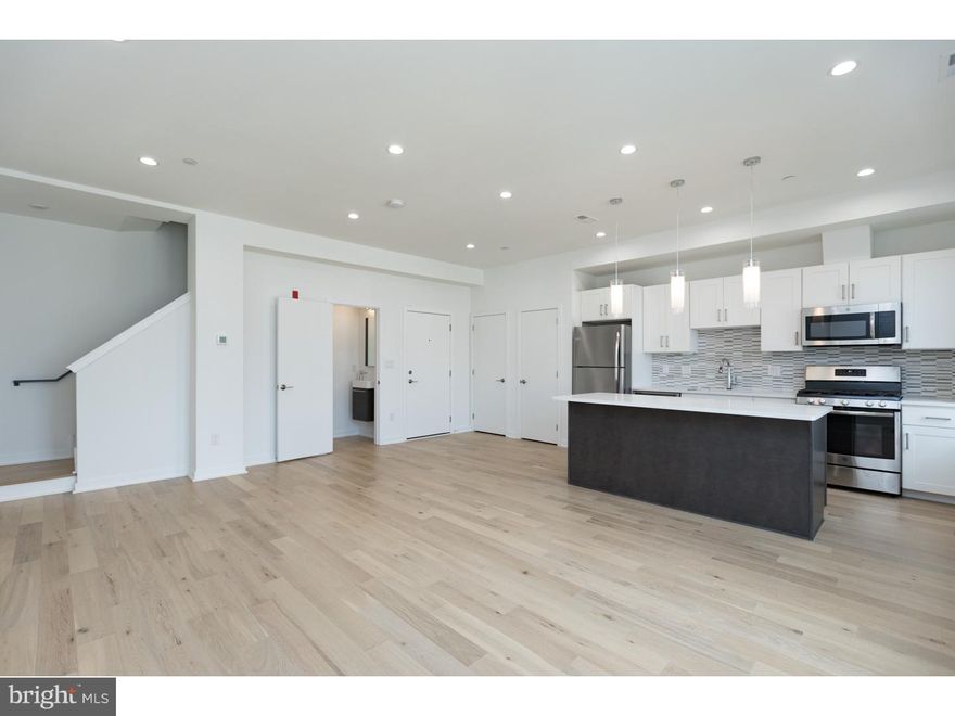 Amazing opportunity to be the first to live in this luxurious apartment in ultra desirable Fishtown / East Kensington. This unit features 2 bedrooms & 1.5 baths, and private roof deck(!) with amazing panoramic views of the city skyline and surrounding neighborhood.  OPen and light filled kitchen with shaker-style cabinetry, quartz counter-tops, and stainless steel appliances. A walker's paradise and extremely bike friendly yet located close to major roadways and public transportation. Conveniently located near the perpetually hip Frankford Ave corridor as well as popular neighborhood establishments such as Memphis Taproom, Loco Pez, Philadelphia Brewing Co, Martha and much more. Make your visit today!