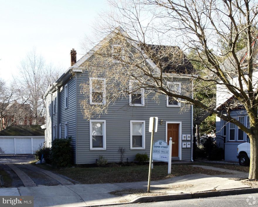 57 Cooper Street in Woodbury, NJ, is an investment property featuring three private offices currently occupied by 1 tenant,  a residential unit on the second floor, and four detached garages. The property includes a shared driveway and rear parking, making it a convenient location near the municipal building and courthouse. It offers multiple income streams, with offices, an apartment, and garages all generating rental revenue. Please see the P&L in documents.