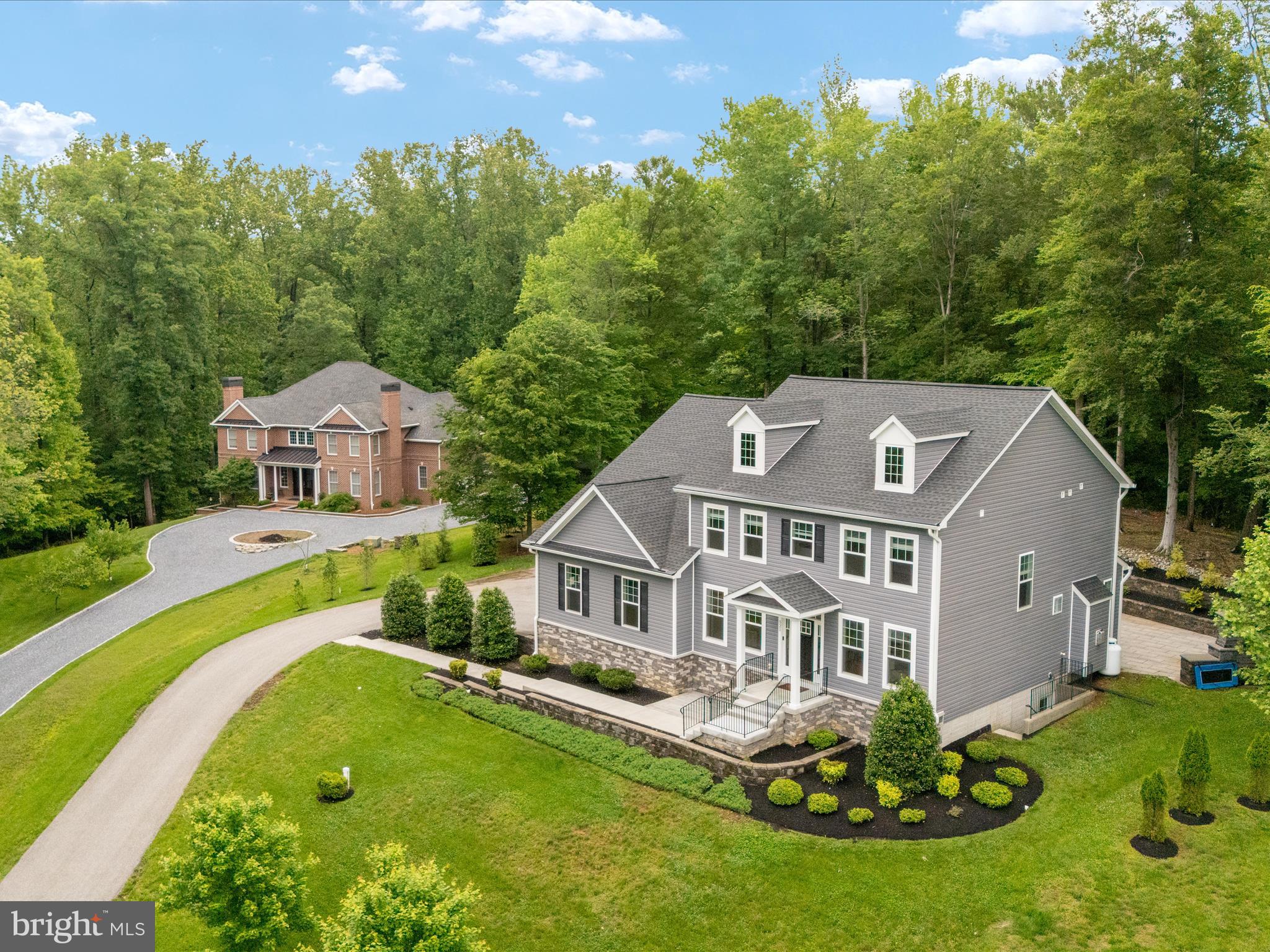 Welcome to Severn Landing! This newly built home is perched on a private lot backing to trees and conservation area. The expansive main level features hardwood floors, high ceilings, gourmet kitchen with large island and ample cabinet/counter space. The family room off the kitchen features tons of natural light and a gas fireplace. The formal dining room and front sitting room provide an inviting entry for guests! The upper level features NEW carpet and spacious bedrooms including an primary suite with tray ceilings, 2 walk-in closets (one has flex space for an office/hobby room) , luxury bathroom ensuite (recently remodeled) that includes a European Wet style shower, quartz wall, and 6' long soaking tub! The lower level finished basement (recently remodeled) has LVP flooring, wet bar/kitchenette with kegerator, full bathroom, and home gym / additional flex space. The outdoor spaces make this home a showstopper and includes newly added hardscaping, screened in porch, 30x18 (20 ' tall) pavilion with outdoor kitchen, firepit, and custom patio! Freshly painted from top to bottom too! Members of the community can join the Community Association of Palisades for water access and beach access as well - Voluntary! Welcome Home!