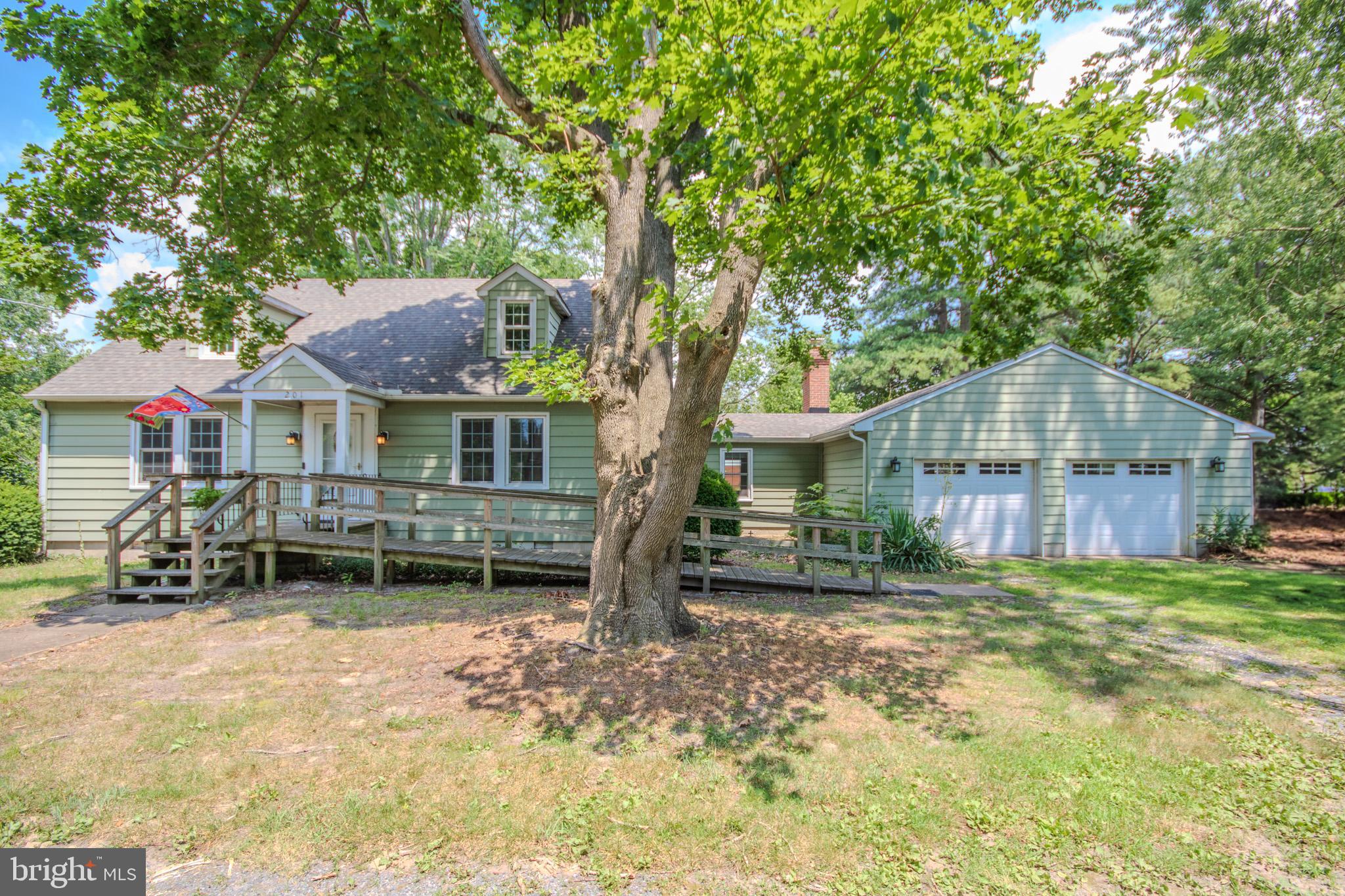 Great location! Double lot with no HOA or city restrictions! This one owner home has a fully remodeled interior with new flooring, paint, appliances and fixtures. There's a new roof and the septic has been inspected, had minor repairs and is in good shape! It's near the end of a cul de sac and is so conveniently located with easy access to Rt. 50 and Rt. 13, restaurants and shopping. Seller can remove the ramp at the front if a buyer wishes. This home is move in ready and priced under the appraised value. Come take a look before it's gone!