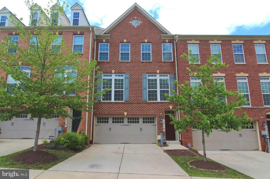 Beautiful 4 level townhouse in great community! LL rec room with 1/2 bath and huge unfinished storage area.  Main level boasts gleaming hardwood floors, granite kitchen with SS appliances, formal DR and LR w/chair rail and crown molding.  Upstairs is the huge master bedroom and master bath w/separate shower and tub, two add'l large sized bedrooms and full bath. Backs to woods! Motivated seller.